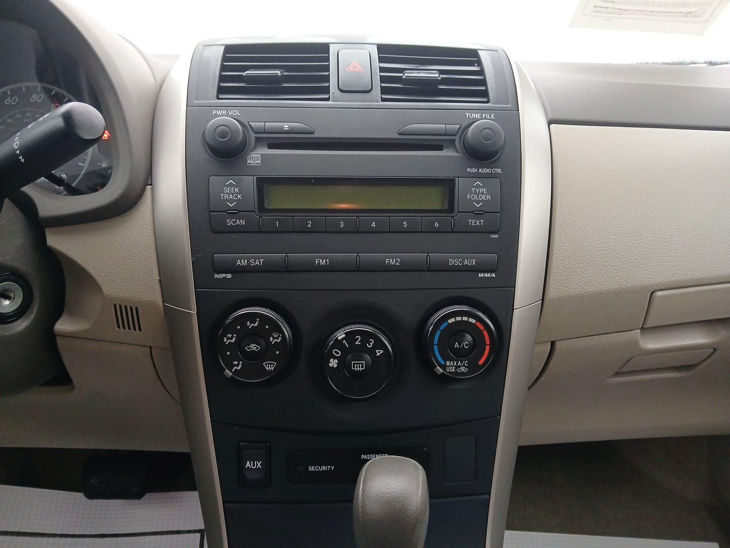 2009 Toyota Corolla LE 4-Speed AT (JTDBL40E79J) with an 1.8L L4 DOHC 16V engine, 4-Speed Automatic transmission, located at 401 Woodman Dr, Riverside, OH, 45431, (937) 908-9800, 39.761024, -84.120956 - Photo#12