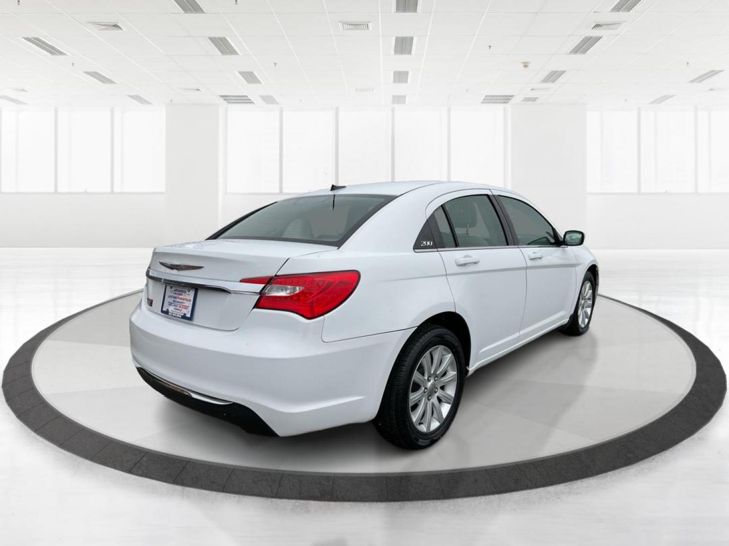 2011 Chrysler 200 Touring (1C3BC1FG5BN) with an 3.6L V6 DOHC 24V FFV engine, 6-Speed Automatic transmission, located at 880 E. National Road, OH, 45377, (937) 908-9800, 39.891918, -84.183975 - Photo#2