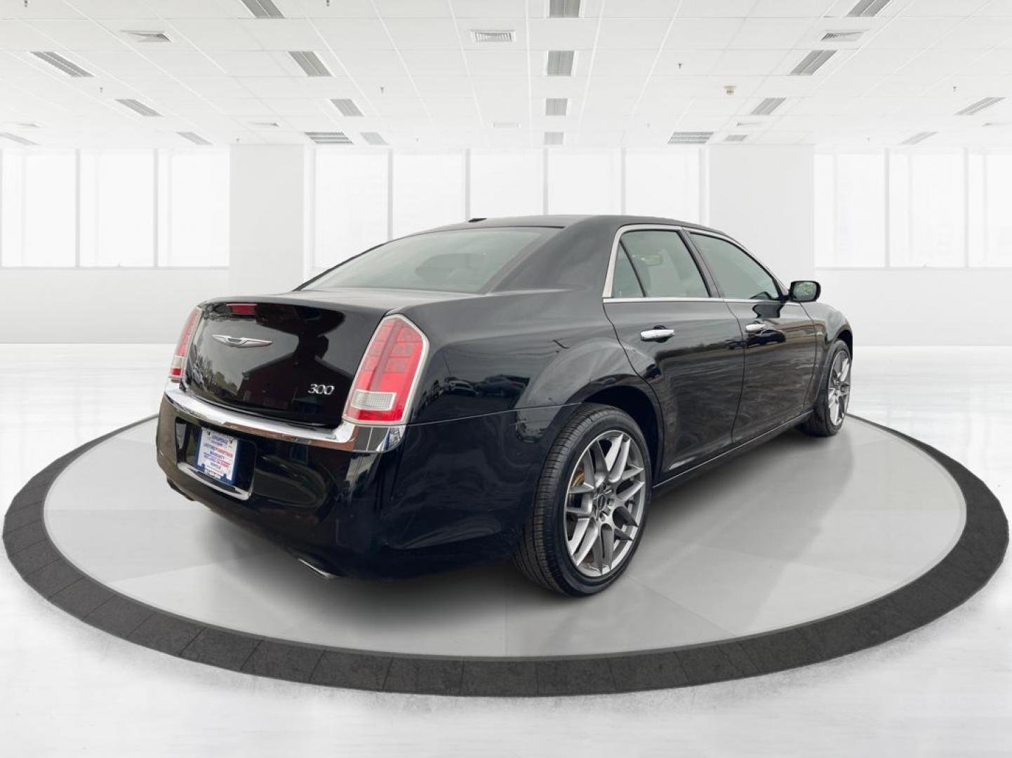 2011 Blackberry Pearl Chrysler 300 Limited RWD (2C3CA5CG4BH) with an 3.6L V6 SOHC 24V engine, 5-Speed Automatic transmission, located at 1184 Kauffman Ave, Fairborn, OH, 45324, (937) 908-9800, 39.807072, -84.031563 - Photo#1