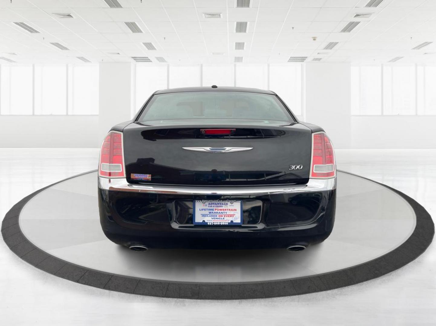 2011 Blackberry Pearl Chrysler 300 Limited RWD (2C3CA5CG4BH) with an 3.6L V6 SOHC 24V engine, 5-Speed Automatic transmission, located at 1184 Kauffman Ave, Fairborn, OH, 45324, (937) 908-9800, 39.807072, -84.031563 - Photo#2