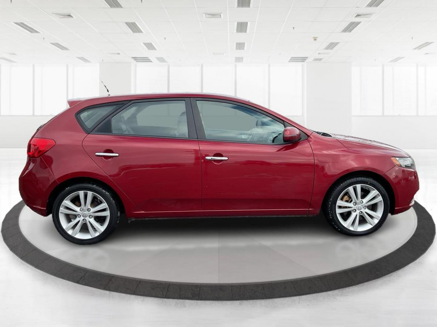 2011 Spicy Red Metallic Kia Forte 5-Door SX (KNAFW5A33B5) with an 2.4L L4 DOHC 16V engine, located at 880 E. National Road, OH, 45377, (937) 908-9800, 39.891918, -84.183975 - Photo#1