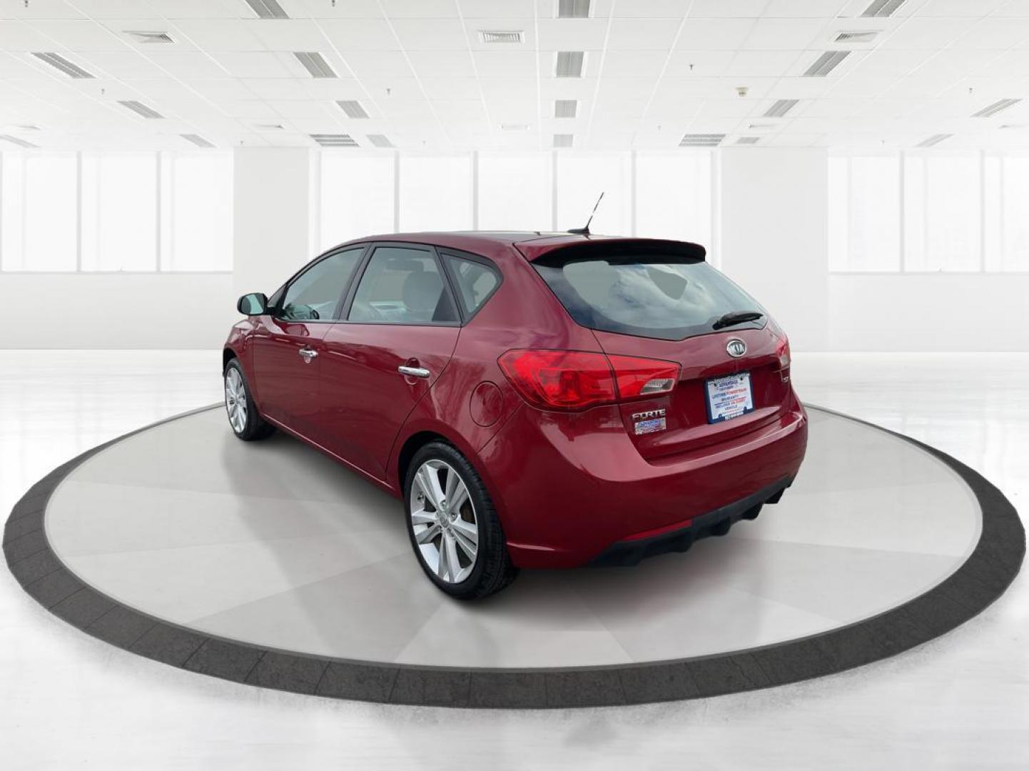 2011 Spicy Red Metallic Kia Forte 5-Door SX (KNAFW5A33B5) with an 2.4L L4 DOHC 16V engine, located at 880 E. National Road, OH, 45377, (937) 908-9800, 39.891918, -84.183975 - Photo#4