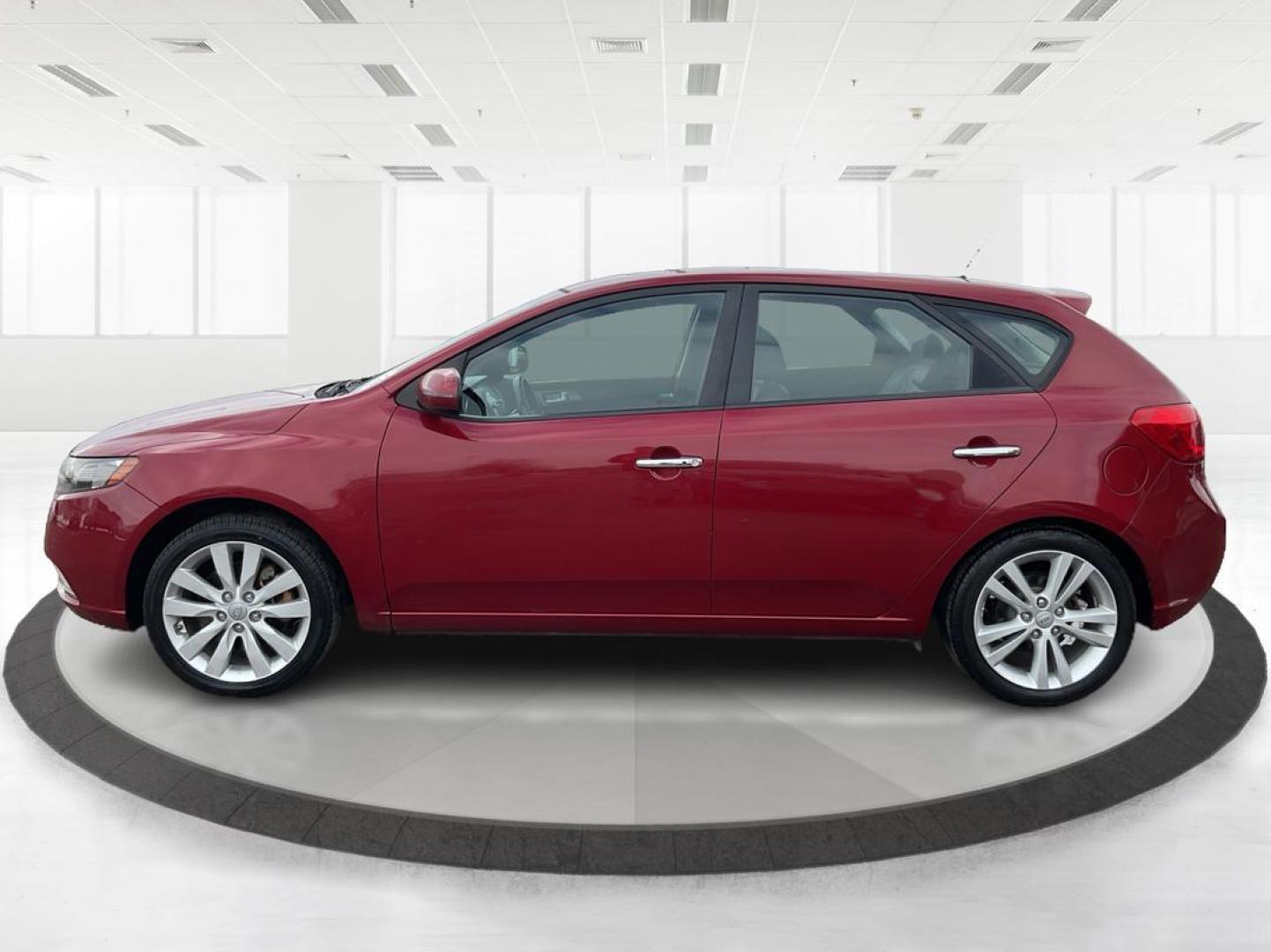 2011 Spicy Red Metallic Kia Forte 5-Door SX (KNAFW5A33B5) with an 2.4L L4 DOHC 16V engine, located at 880 E. National Road, OH, 45377, (937) 908-9800, 39.891918, -84.183975 - Photo#5