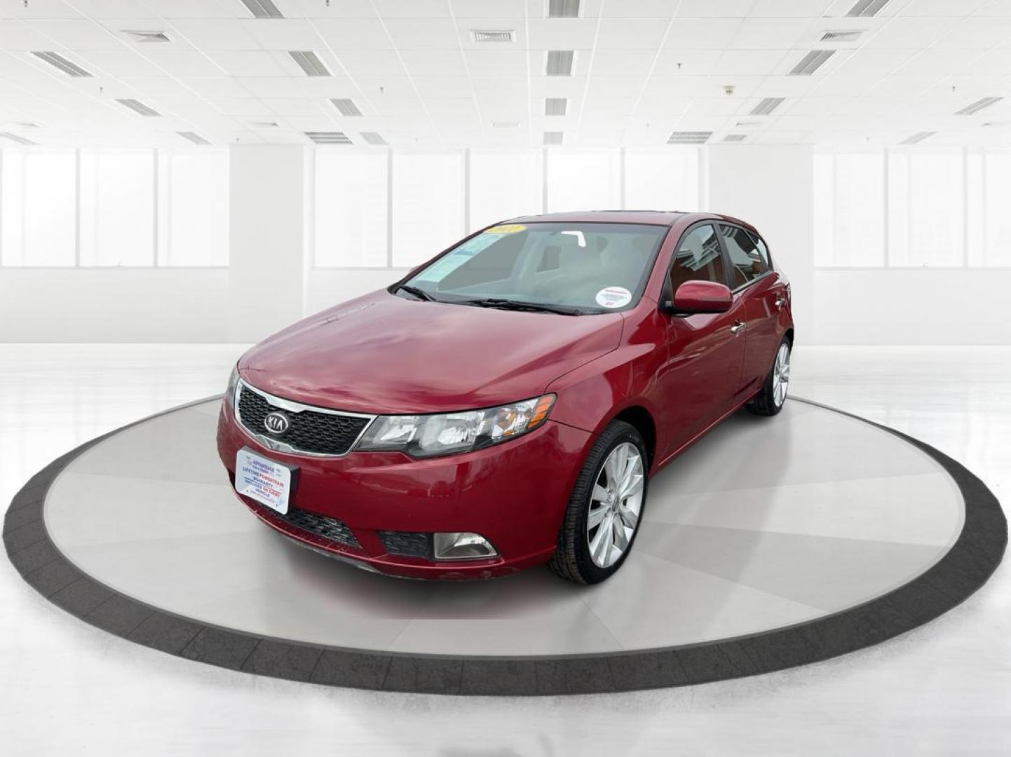 2011 Spicy Red Metallic Kia Forte 5-Door SX (KNAFW5A33B5) with an 2.4L L4 DOHC 16V engine, located at 880 E. National Road, OH, 45377, (937) 908-9800, 39.891918, -84.183975 - Photo#7