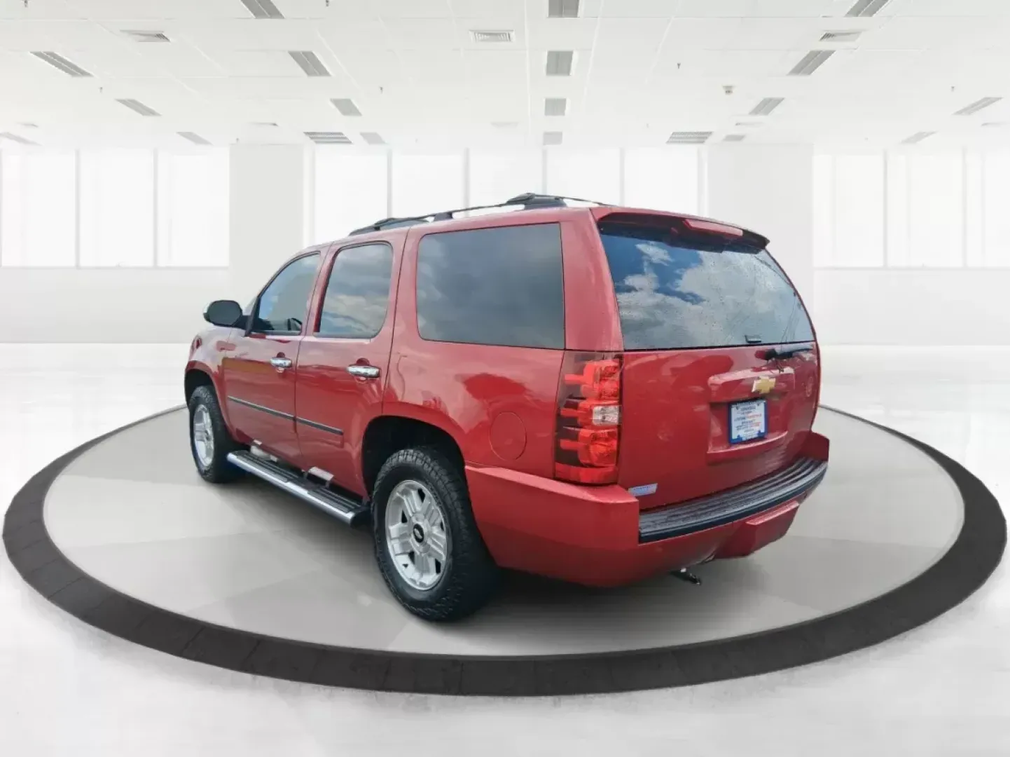 2012 Chevrolet Tahoe LTZ (1GNSKCE09CR) with an Vortec 5.3L V-8 variable valve control engine, located at 8750 N County Rd 25A, Piqua, OH, 45356, (937) 908-9800, 40.164391, -84.232513 - Photo#4