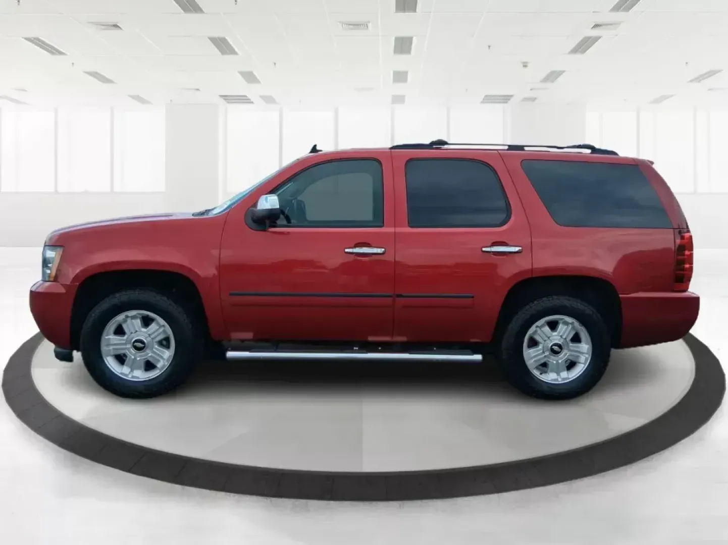 2012 Chevrolet Tahoe LTZ (1GNSKCE09CR) with an Vortec 5.3L V-8 variable valve control engine, located at 8750 N County Rd 25A, Piqua, OH, 45356, (937) 908-9800, 40.164391, -84.232513 - Photo#5