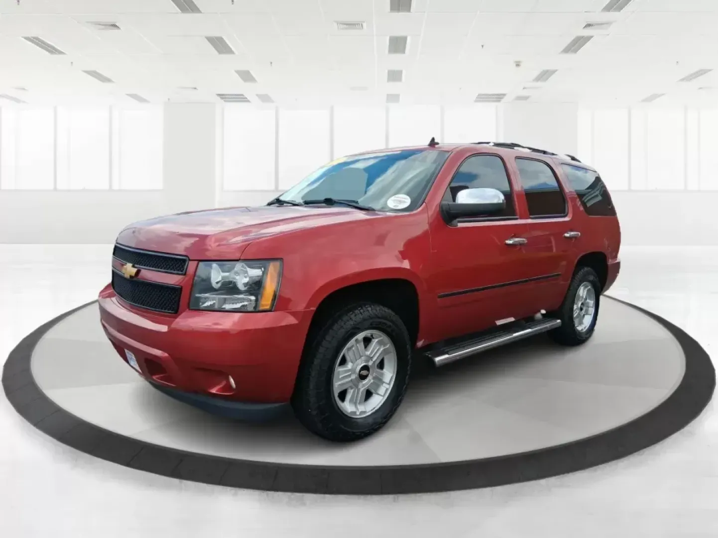2012 Chevrolet Tahoe LTZ (1GNSKCE09CR) with an Vortec 5.3L V-8 variable valve control engine, located at 8750 N County Rd 25A, Piqua, OH, 45356, (937) 908-9800, 40.164391, -84.232513 - Photo#7