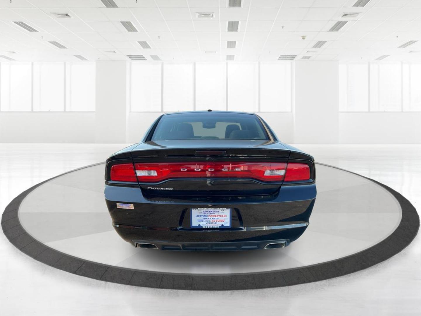 2012 Pitch Black Dodge Charger SE (2C3CDXBGXCH) with an 3.6L V6 DOHC 24V engine, 5-Speed Automatic transmission, located at 401 Woodman Dr, Riverside, OH, 45431, (937) 908-9800, 39.761024, -84.120956 - Photo#3