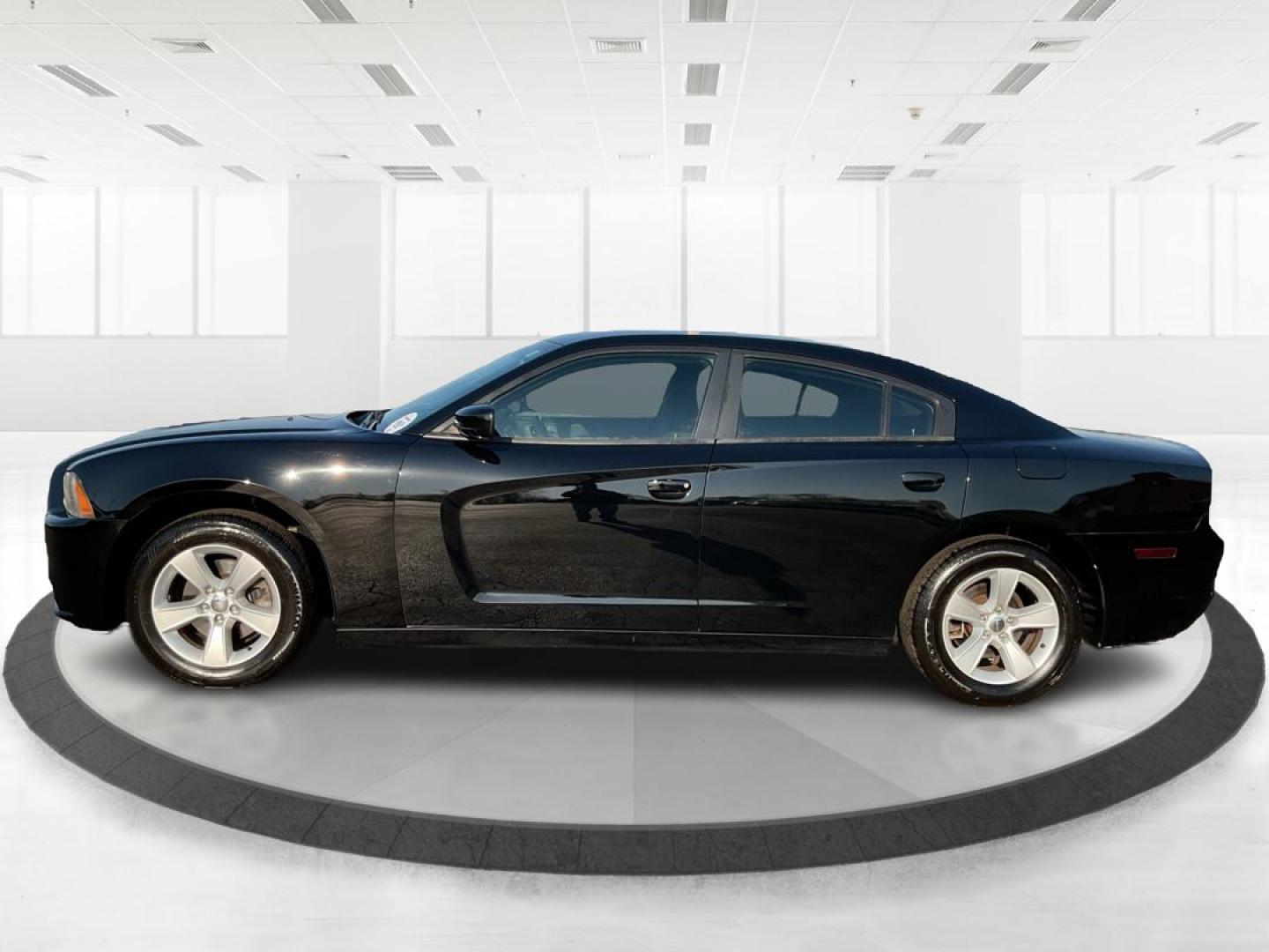 2012 Pitch Black Dodge Charger SE (2C3CDXBGXCH) with an 3.6L V6 DOHC 24V engine, 5-Speed Automatic transmission, located at 401 Woodman Dr, Riverside, OH, 45431, (937) 908-9800, 39.761024, -84.120956 - Photo#5