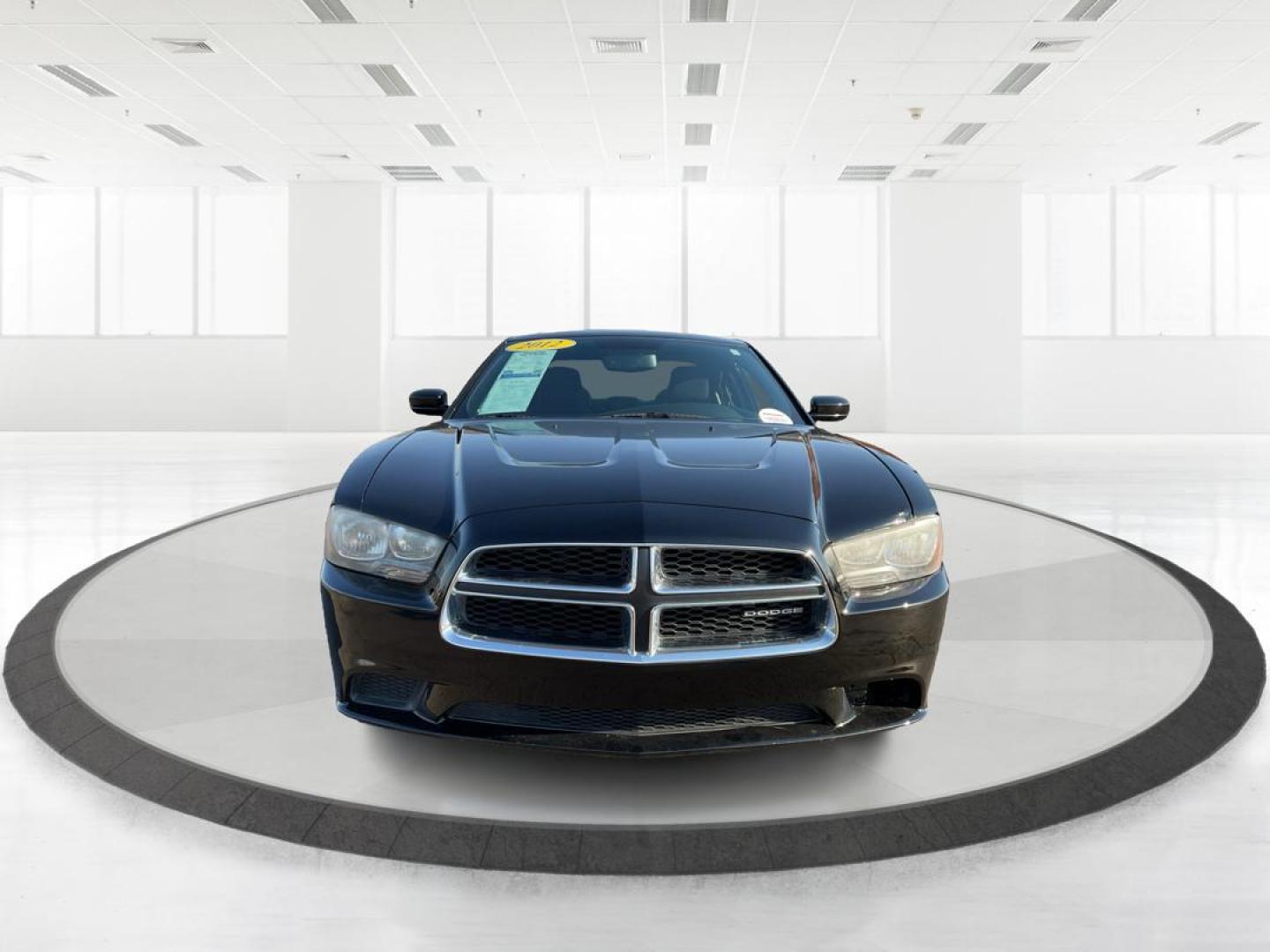 2012 Pitch Black Dodge Charger SE (2C3CDXBGXCH) with an 3.6L V6 DOHC 24V engine, 5-Speed Automatic transmission, located at 401 Woodman Dr, Riverside, OH, 45431, (937) 908-9800, 39.761024, -84.120956 - Photo#6