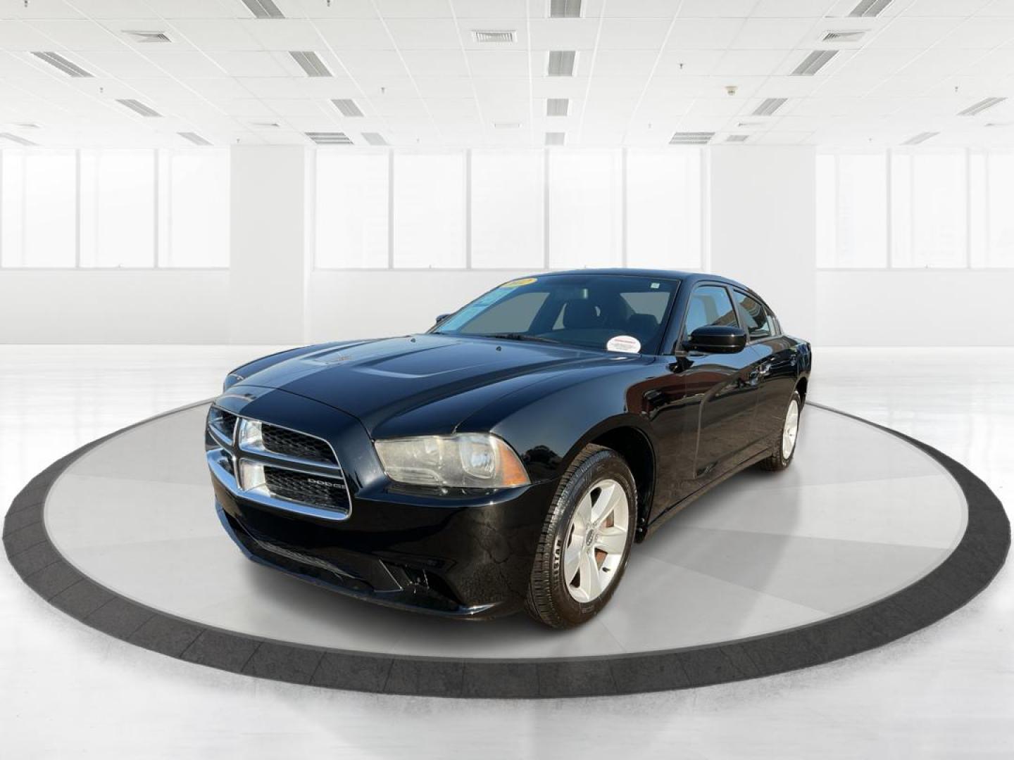 2012 Pitch Black Dodge Charger SE (2C3CDXBGXCH) with an 3.6L V6 DOHC 24V engine, 5-Speed Automatic transmission, located at 401 Woodman Dr, Riverside, OH, 45431, (937) 908-9800, 39.761024, -84.120956 - Photo#7