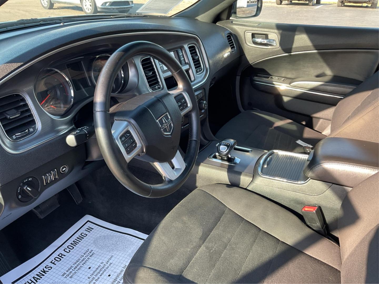 2012 Pitch Black Dodge Charger SE (2C3CDXBGXCH) with an 3.6L V6 DOHC 24V engine, 5-Speed Automatic transmission, located at 401 Woodman Dr, Riverside, OH, 45431, (937) 908-9800, 39.761024, -84.120956 - Photo#8