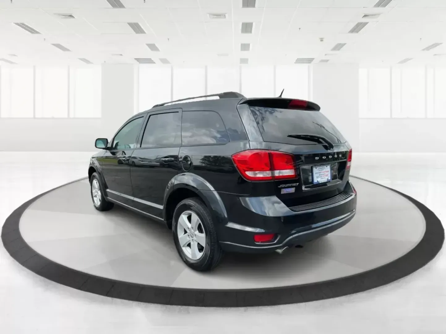 2012 Dodge Journey SXT (3C4PDCBG5CT) with an 2.4L I-4 DOHC engine, located at 401 Woodman Dr, Riverside, OH, 45431, (937) 908-9800, 39.761024, -84.120956 - Photo#4