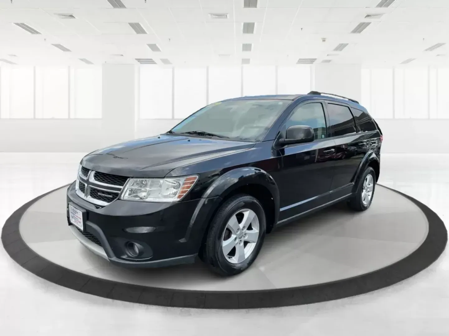 2012 Dodge Journey SXT (3C4PDCBG5CT) with an 2.4L I-4 DOHC engine, located at 401 Woodman Dr, Riverside, OH, 45431, (937) 908-9800, 39.761024, -84.120956 - Photo#7