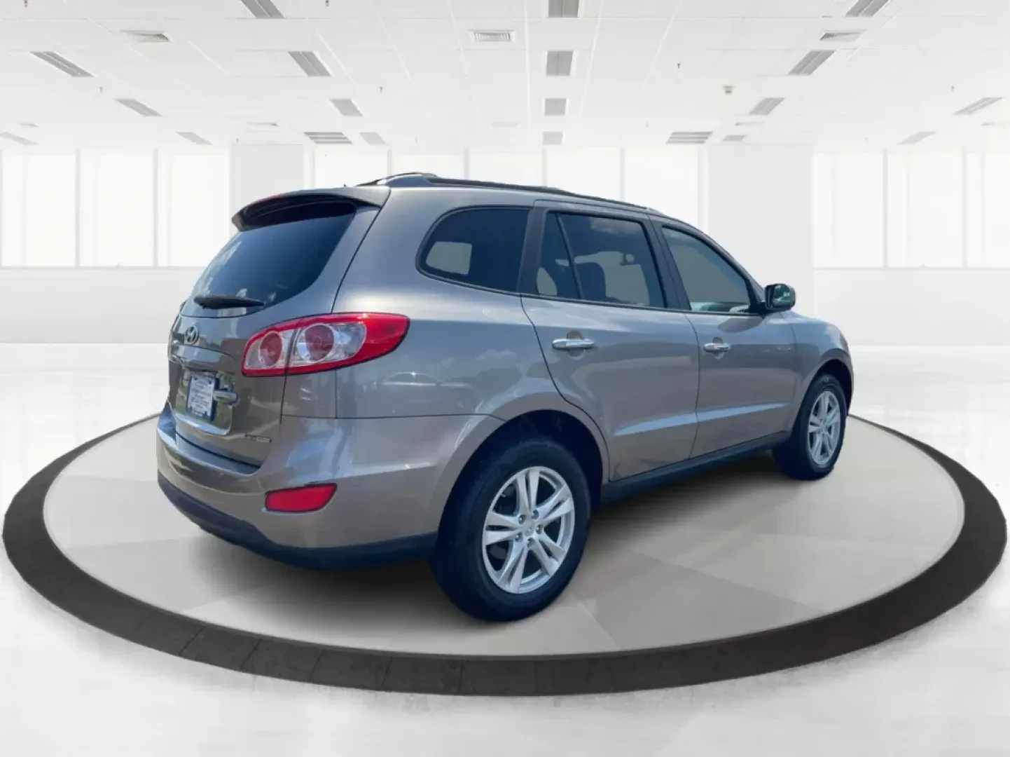2012 Hyundai Santa Fe Limited V6 (5XYZKDAG0CG) with an 3.5L V-6 DOHC engine, located at 4508 South Dixie Dr, Moraine, OH, 45439, (937) 908-9800, 39.807072, -84.031563 - Photo#2