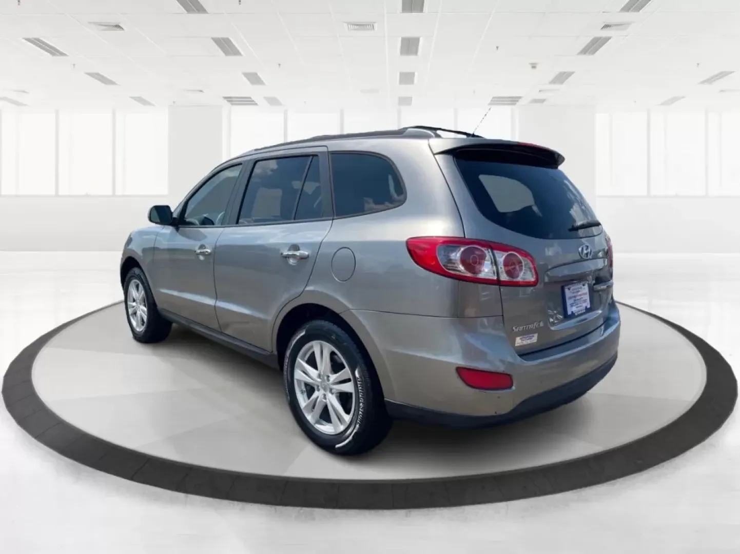 2012 Hyundai Santa Fe Limited V6 (5XYZKDAG0CG) with an 3.5L V-6 DOHC engine, located at 4508 South Dixie Dr, Moraine, OH, 45439, (937) 908-9800, 39.807072, -84.031563 - Photo#4
