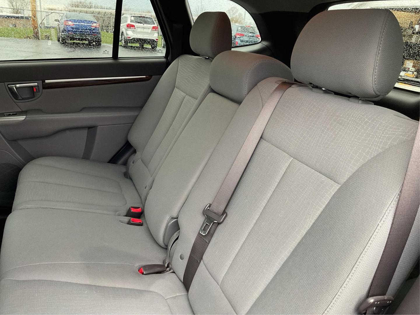 2012 Hyundai Santa Fe GLS (5XYZGDAB5CG) with an 2.4L I-4 DOHC engine, located at 1099 N County Rd 25A , Troy, OH, 45373, (937) 908-9800, 40.057041, -84.215462 - Photo#9