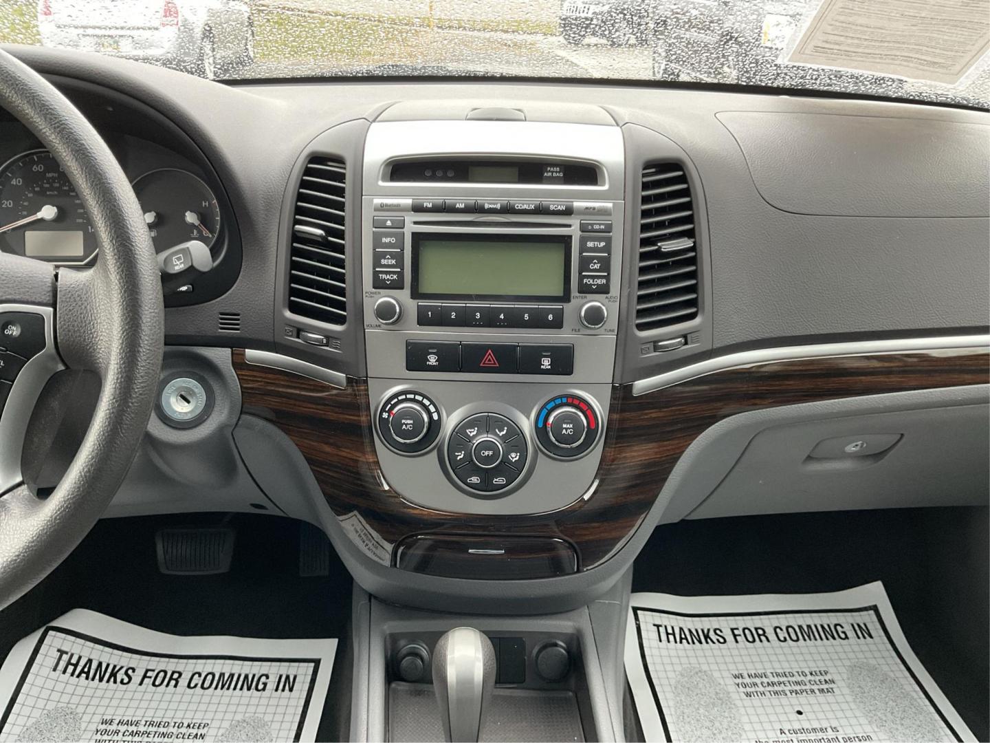 2012 Hyundai Santa Fe GLS (5XYZGDAB5CG) with an 2.4L I-4 DOHC engine, located at 1099 N County Rd 25A , Troy, OH, 45373, (937) 908-9800, 40.057041, -84.215462 - Photo#12