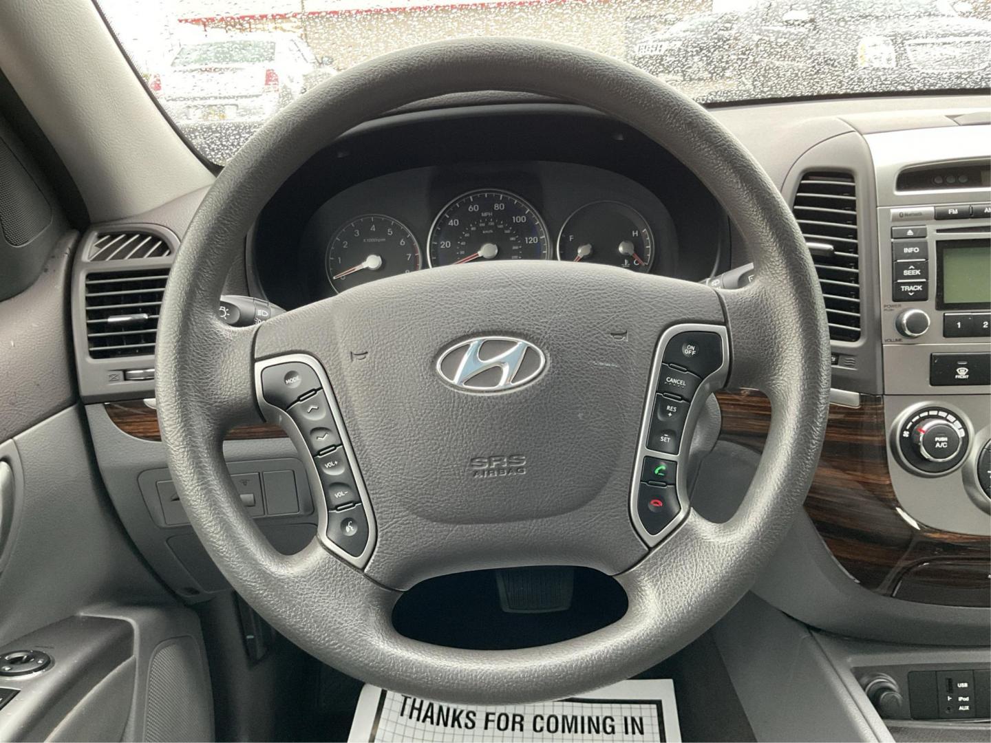 2012 Hyundai Santa Fe GLS (5XYZGDAB5CG) with an 2.4L I-4 DOHC engine, located at 1099 N County Rd 25A , Troy, OH, 45373, (937) 908-9800, 40.057041, -84.215462 - Photo#15