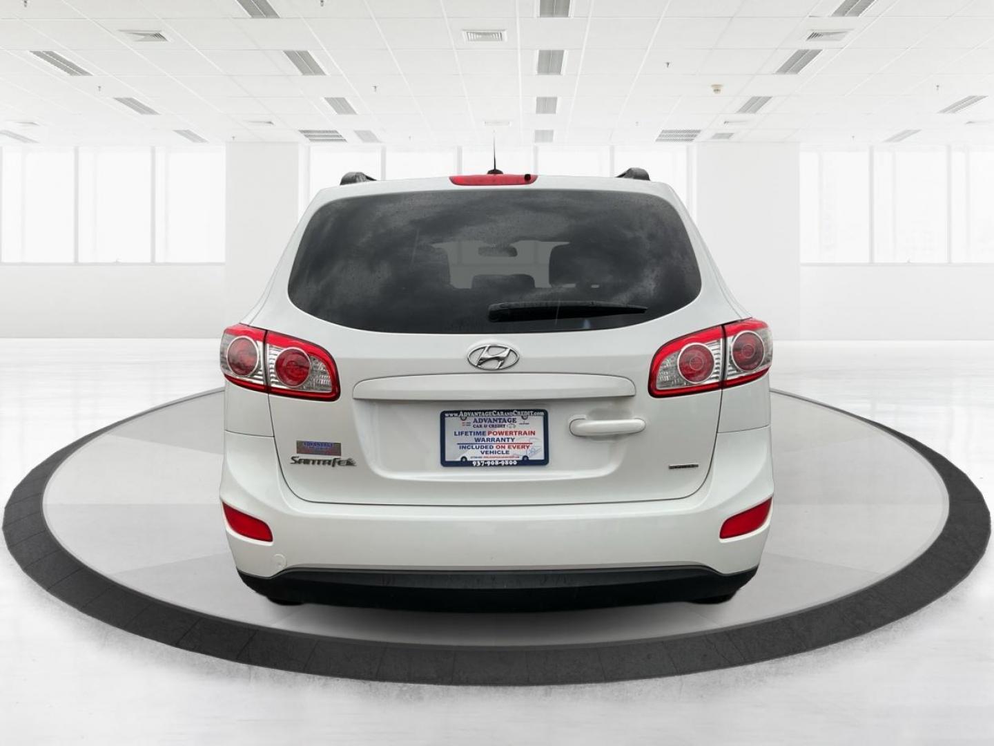 2012 Hyundai Santa Fe GLS (5XYZGDAB5CG) with an 2.4L I-4 DOHC engine, located at 1099 N County Rd 25A , Troy, OH, 45373, (937) 908-9800, 40.057041, -84.215462 - Photo#3