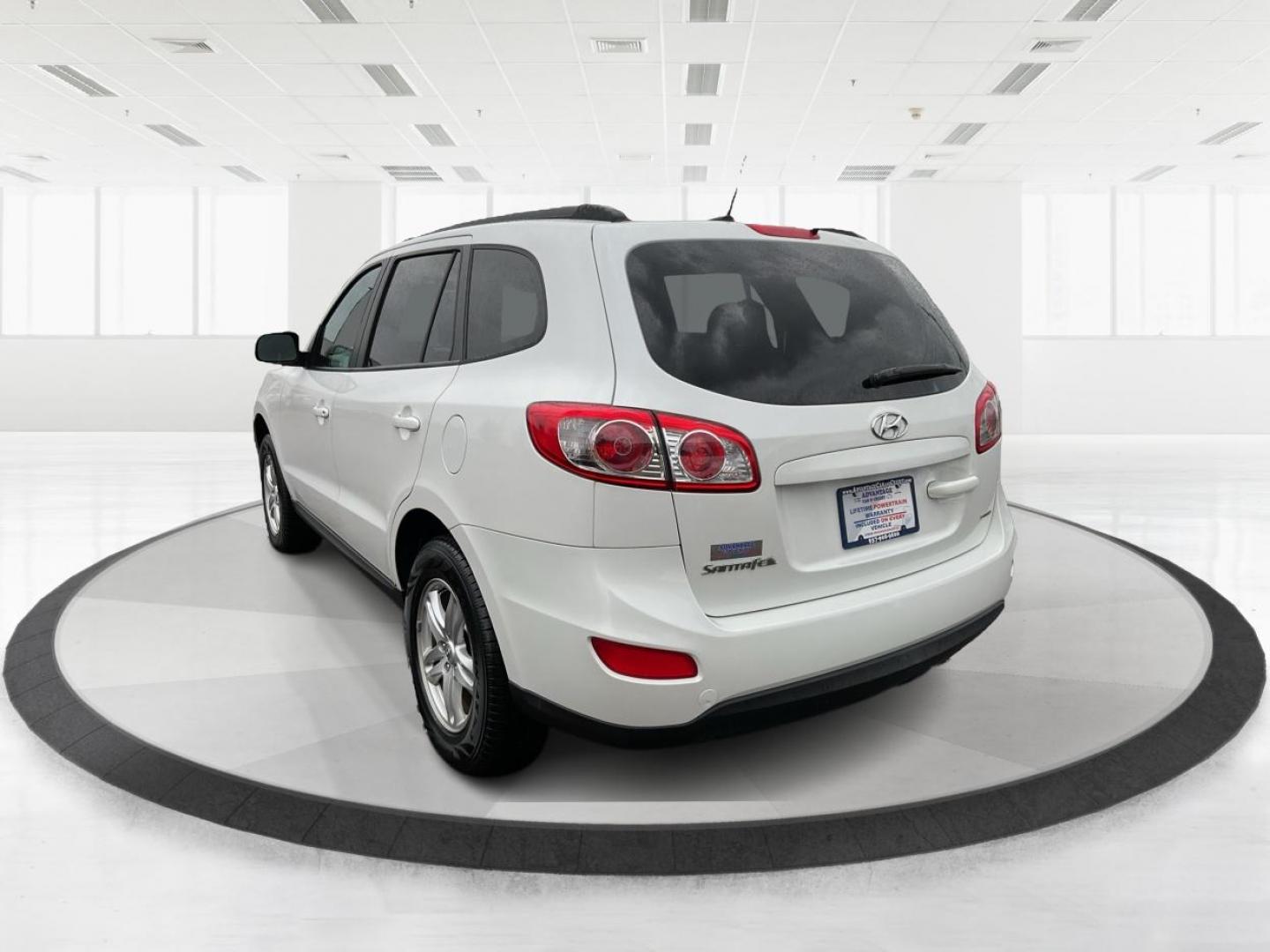 2012 Hyundai Santa Fe GLS (5XYZGDAB5CG) with an 2.4L I-4 DOHC engine, located at 1099 N County Rd 25A , Troy, OH, 45373, (937) 908-9800, 40.057041, -84.215462 - Photo#4