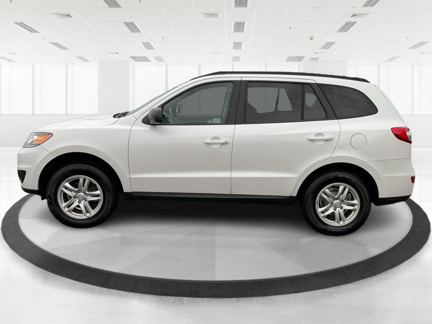 2012 Hyundai Santa Fe GLS (5XYZGDAB5CG) with an 2.4L I-4 DOHC engine, located at 1099 N County Rd 25A , Troy, OH, 45373, (937) 908-9800, 40.057041, -84.215462 - Photo#5
