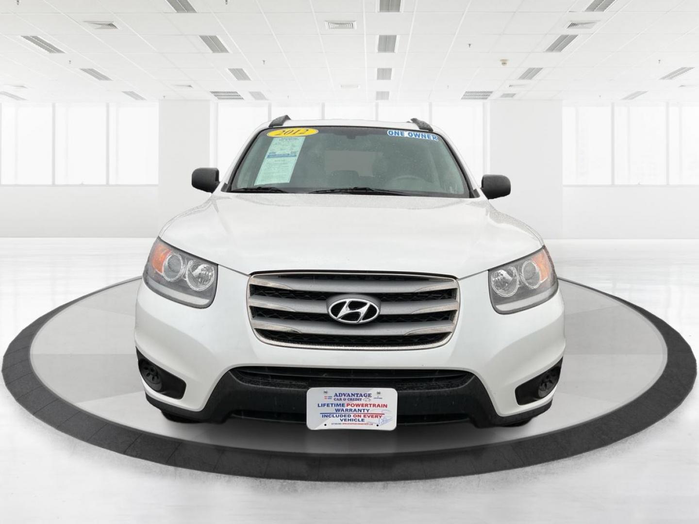 2012 Hyundai Santa Fe GLS (5XYZGDAB5CG) with an 2.4L I-4 DOHC engine, located at 1099 N County Rd 25A , Troy, OH, 45373, (937) 908-9800, 40.057041, -84.215462 - Photo#6
