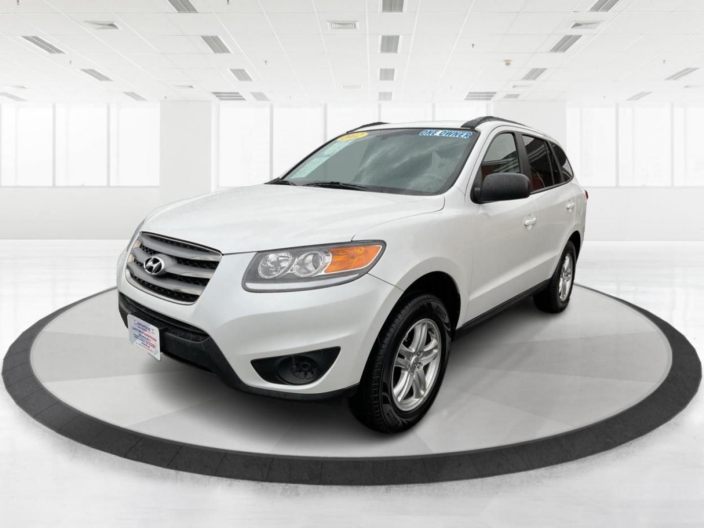 2012 Hyundai Santa Fe GLS (5XYZGDAB5CG) with an 2.4L I-4 DOHC engine, located at 1099 N County Rd 25A , Troy, OH, 45373, (937) 908-9800, 40.057041, -84.215462 - Photo#7