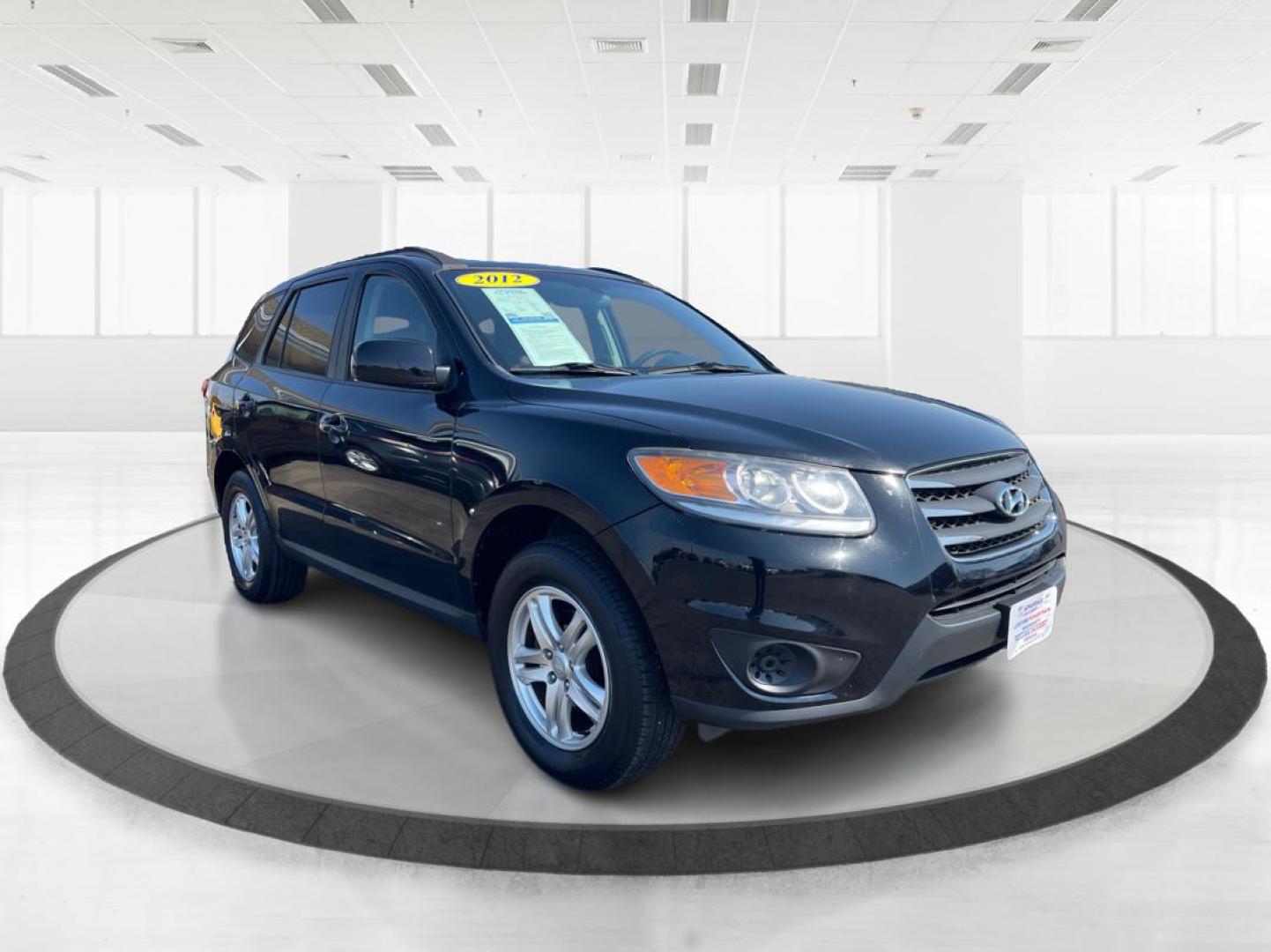 2012 Hyundai Santa Fe GLS (5XYZG3ABXCG) with an 2.4L I-4 DOHC engine, located at 401 Woodman Dr, Riverside, OH, 45431, (937) 908-9800, 39.761024, -84.120956 - Photo#0