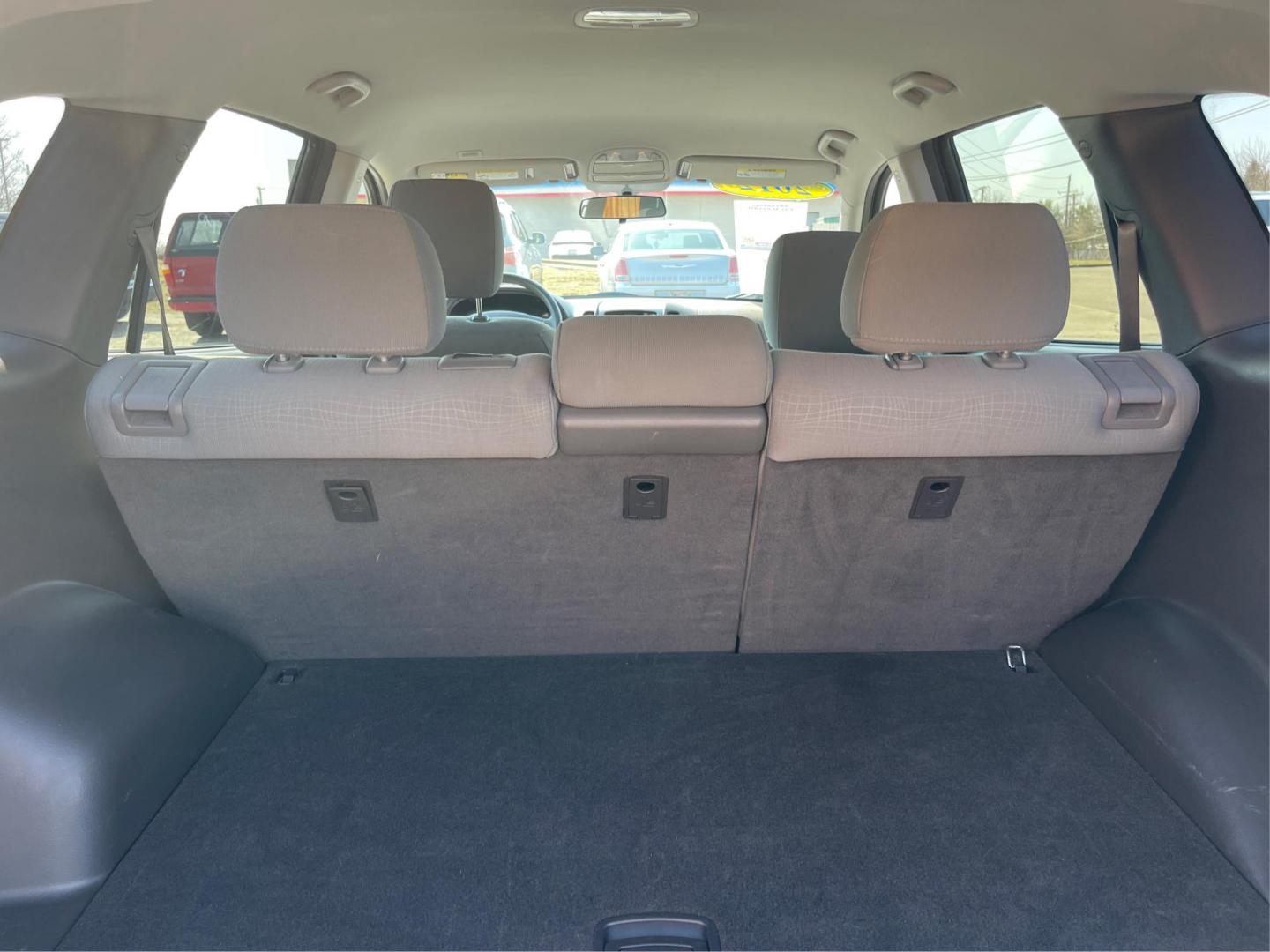 2012 Hyundai Santa Fe GLS (5XYZG3ABXCG) with an 2.4L I-4 DOHC engine, located at 401 Woodman Dr, Riverside, OH, 45431, (937) 908-9800, 39.761024, -84.120956 - Photo#10