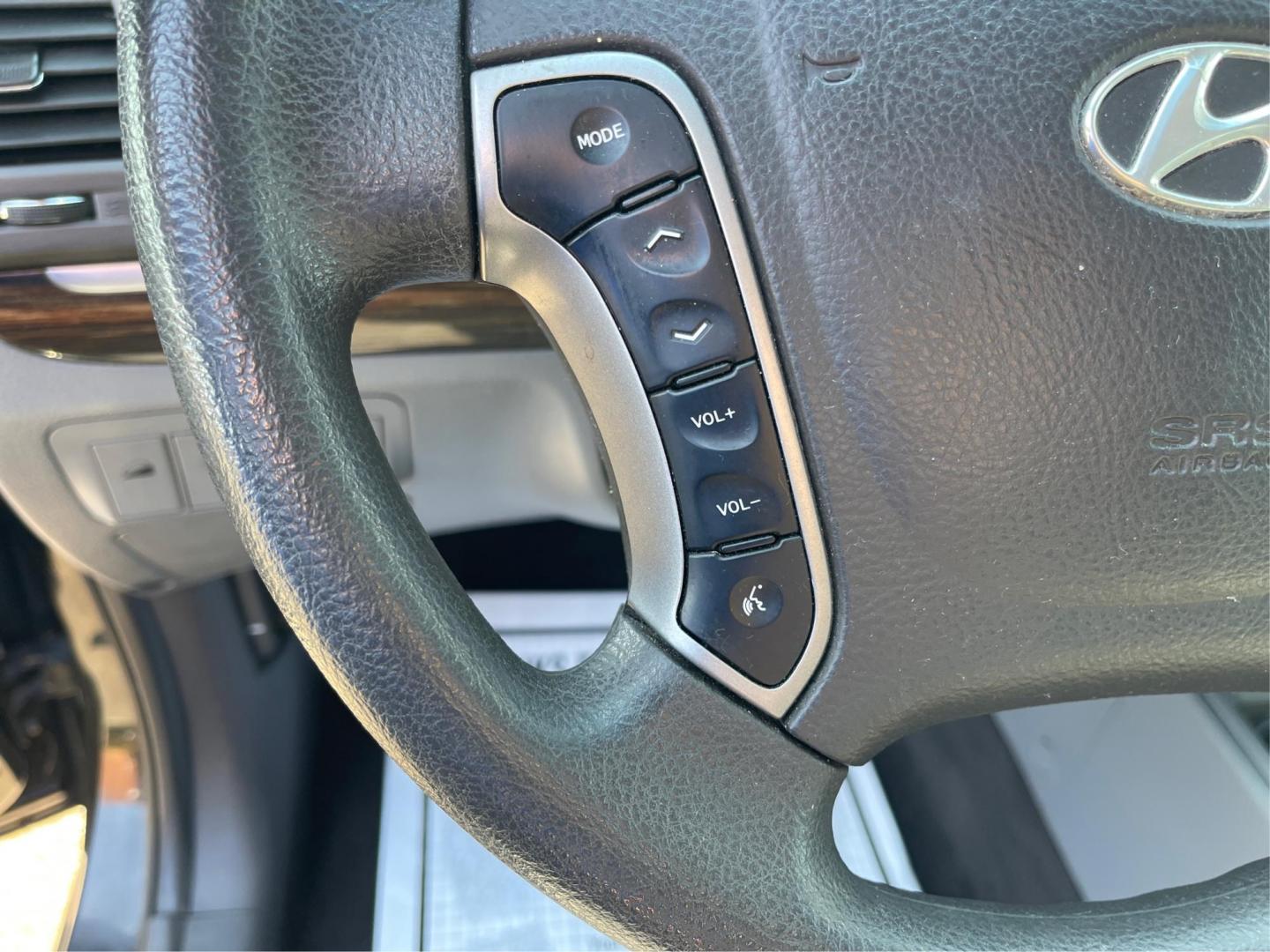2012 Hyundai Santa Fe GLS (5XYZG3ABXCG) with an 2.4L I-4 DOHC engine, located at 401 Woodman Dr, Riverside, OH, 45431, (937) 908-9800, 39.761024, -84.120956 - Photo#14