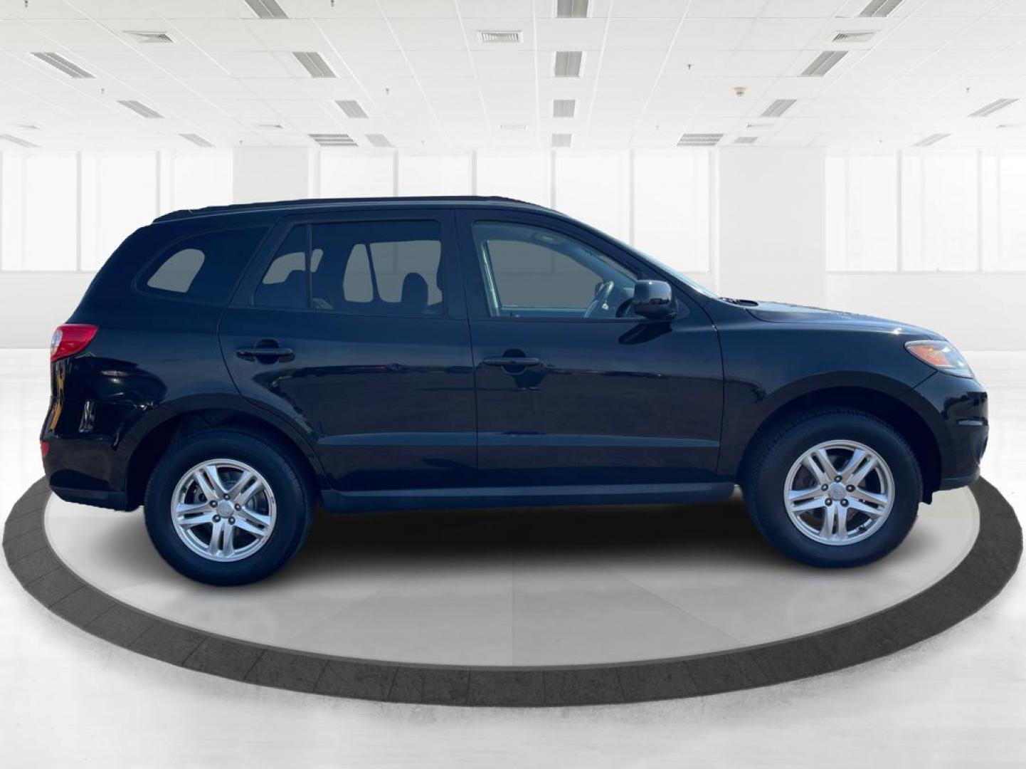 2012 Hyundai Santa Fe GLS (5XYZG3ABXCG) with an 2.4L I-4 DOHC engine, located at 401 Woodman Dr, Riverside, OH, 45431, (937) 908-9800, 39.761024, -84.120956 - Photo#1