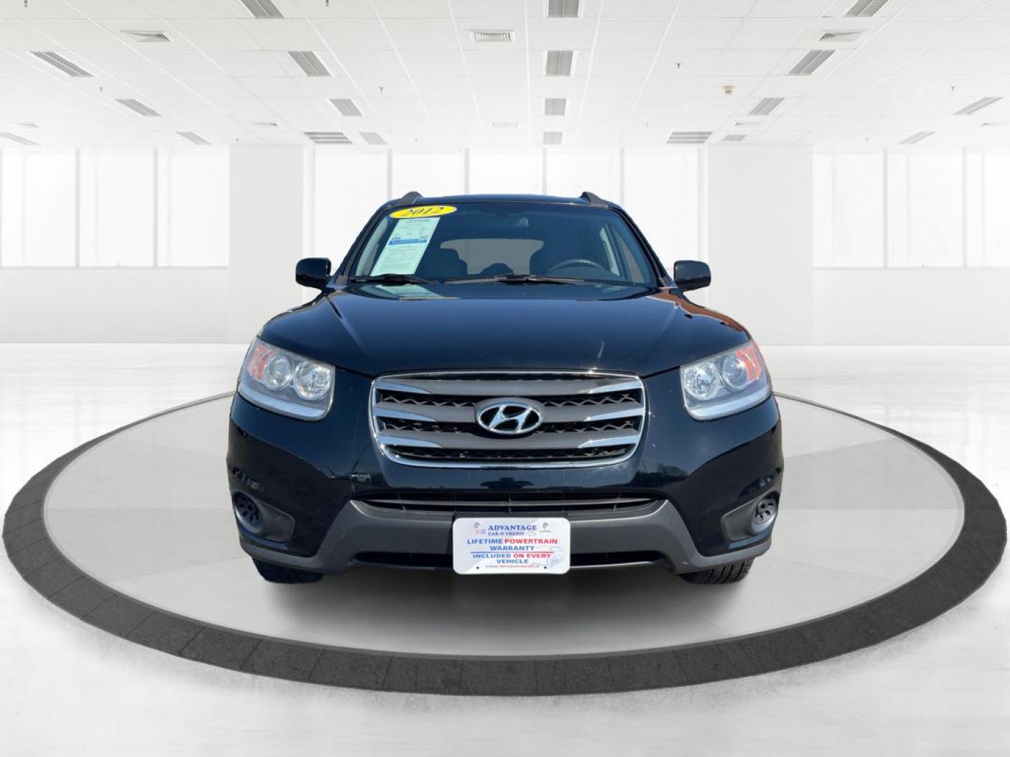 2012 Hyundai Santa Fe GLS (5XYZG3ABXCG) with an 2.4L I-4 DOHC engine, located at 401 Woodman Dr, Riverside, OH, 45431, (937) 908-9800, 39.761024, -84.120956 - Photo#6
