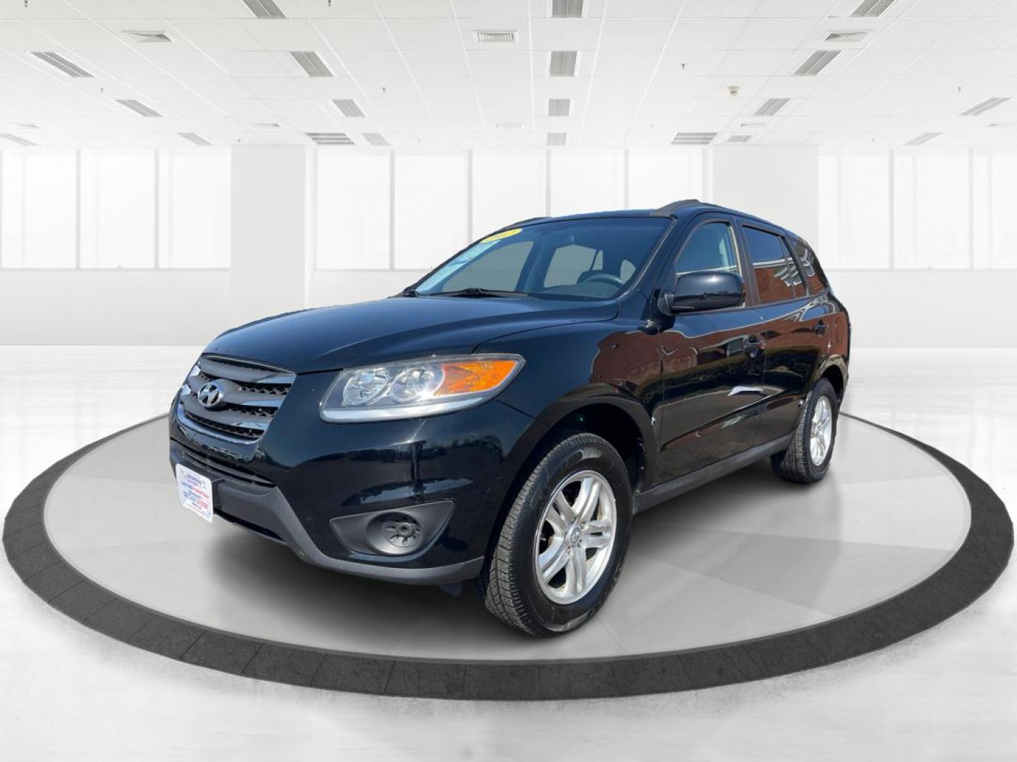 2012 Hyundai Santa Fe GLS (5XYZG3ABXCG) with an 2.4L I-4 DOHC engine, located at 401 Woodman Dr, Riverside, OH, 45431, (937) 908-9800, 39.761024, -84.120956 - Photo#7