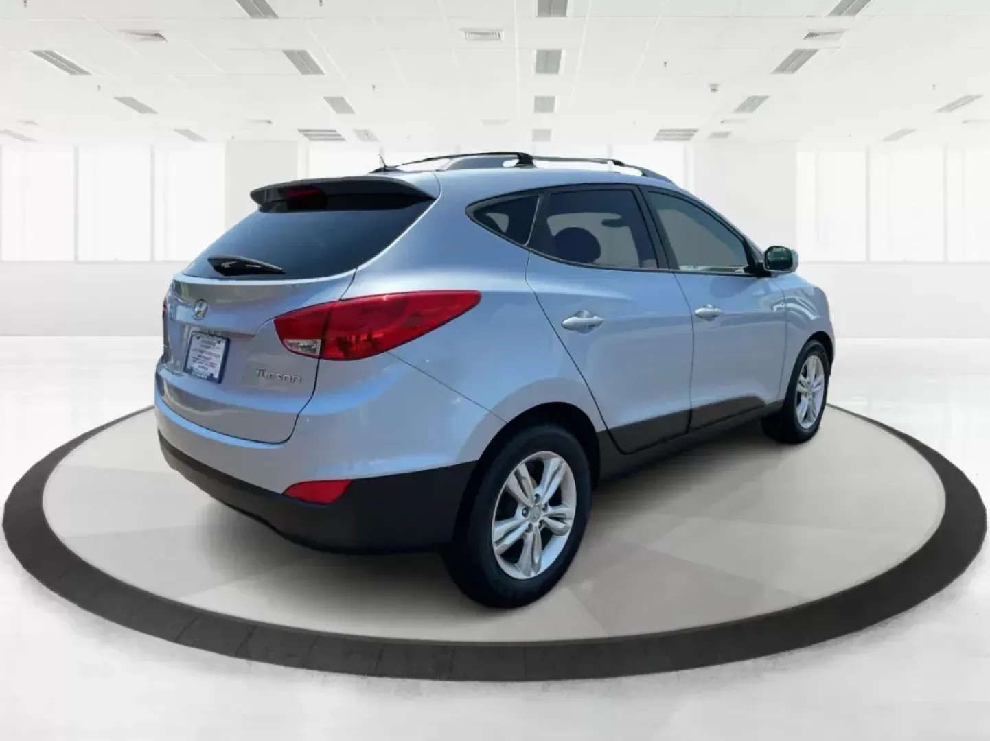2012 Hyundai Tucson GLS (KM8JU3AC7CU) with an Theta II 2.4L I-4 DOHC engine, located at 4508 South Dixie Dr, Moraine, OH, 45439, (937) 908-9800, 39.807072, -84.031563 - Photo#2