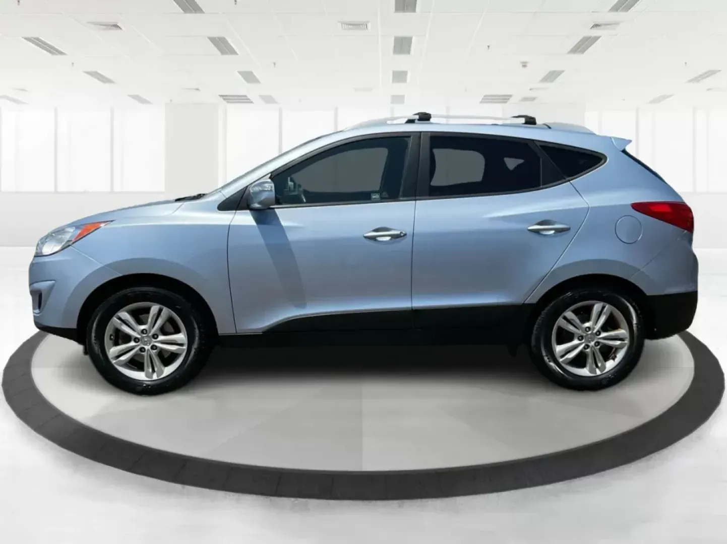 2012 Hyundai Tucson GLS (KM8JU3AC7CU) with an Theta II 2.4L I-4 DOHC engine, located at 4508 South Dixie Dr, Moraine, OH, 45439, (937) 908-9800, 39.807072, -84.031563 - Photo#5