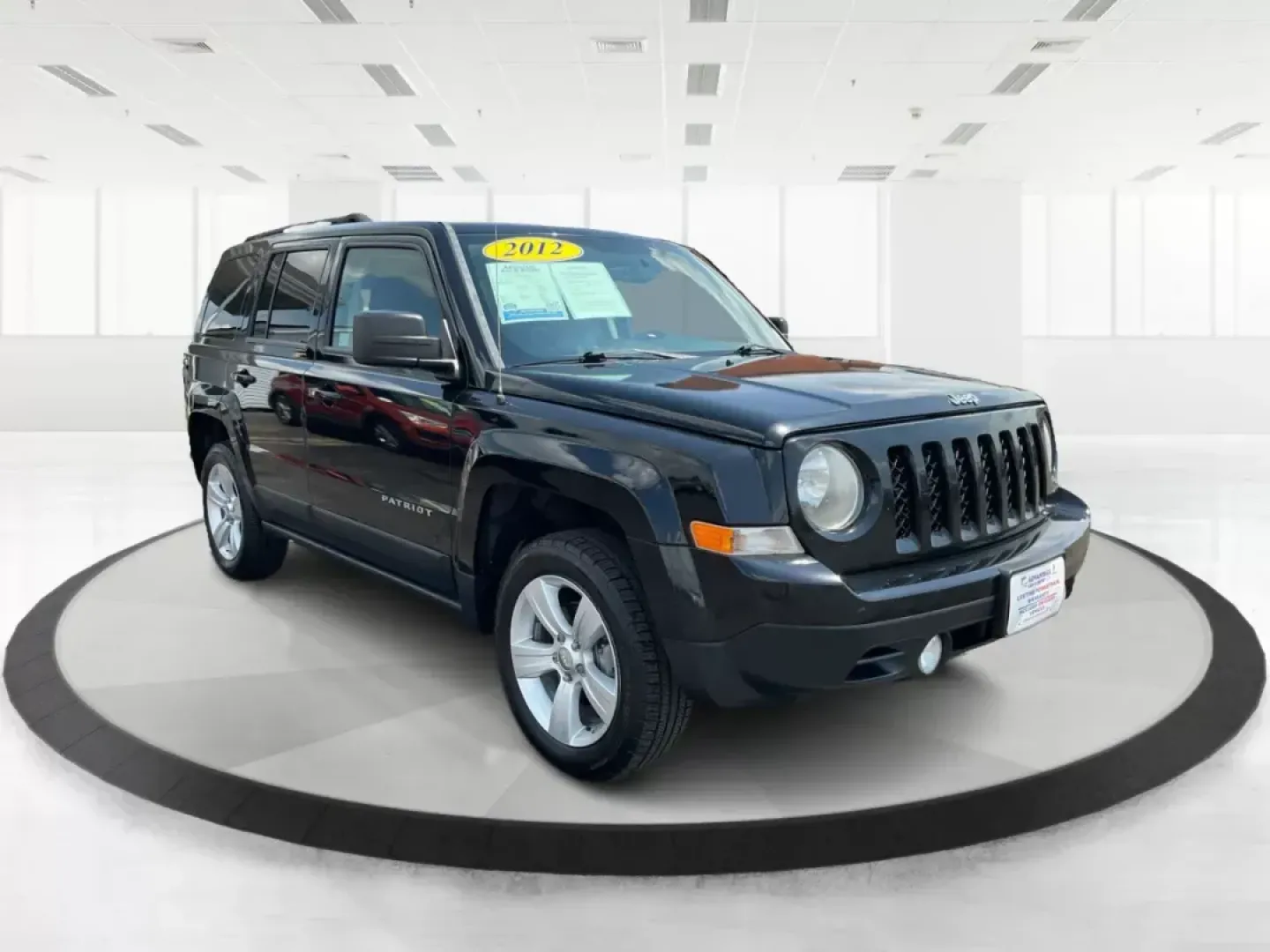 2012 Jeep Patriot Latitude (1C4NJRFB1CD) with an 2.4L I-4 DOHC engine, located at 1230 East Main St, Xenia, OH, 45385, (937) 908-9800, 39.688042, -83.910538 - Photo#0