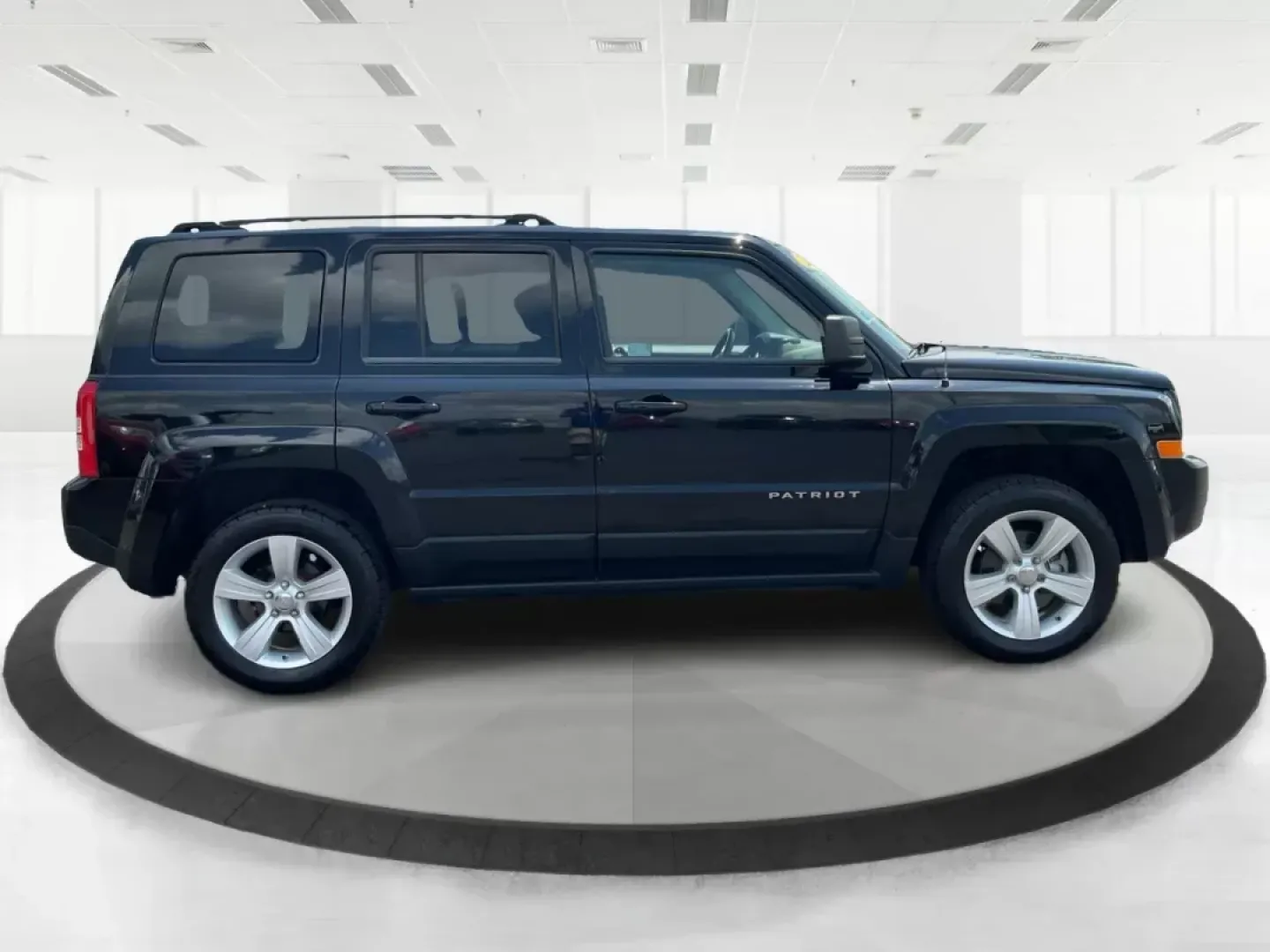 2012 Jeep Patriot Latitude (1C4NJRFB1CD) with an 2.4L I-4 DOHC engine, located at 1230 East Main St, Xenia, OH, 45385, (937) 908-9800, 39.688042, -83.910538 - Photo#1