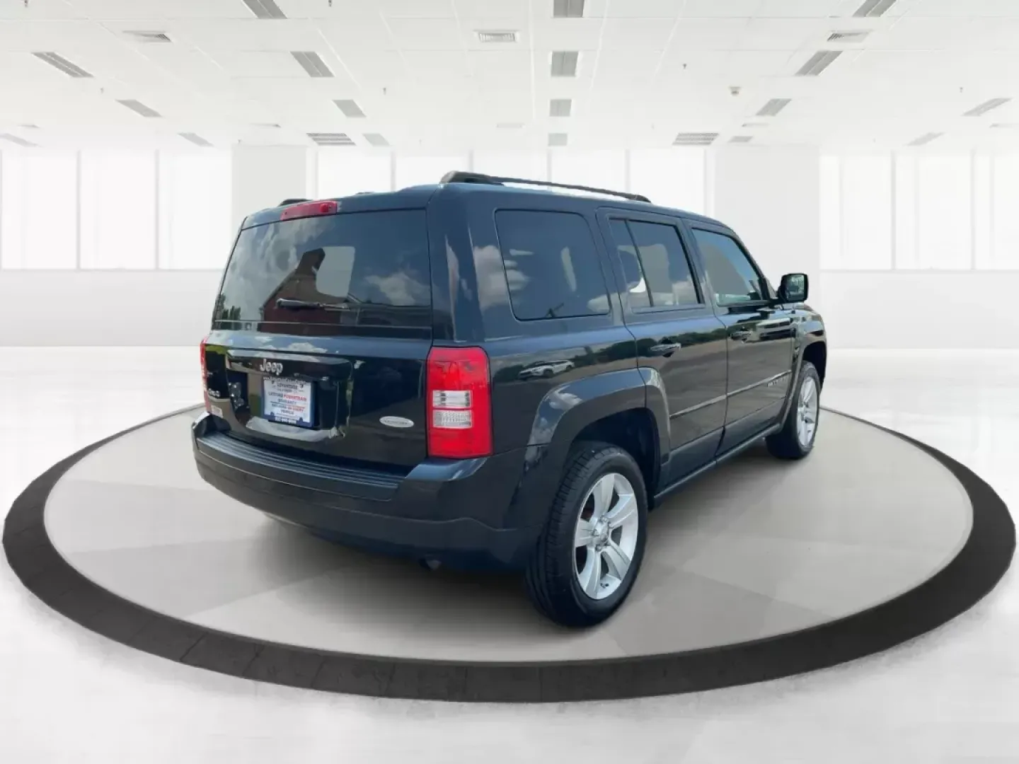 2012 Jeep Patriot Latitude (1C4NJRFB1CD) with an 2.4L I-4 DOHC engine, located at 1230 East Main St, Xenia, OH, 45385, (937) 908-9800, 39.688042, -83.910538 - Photo#2