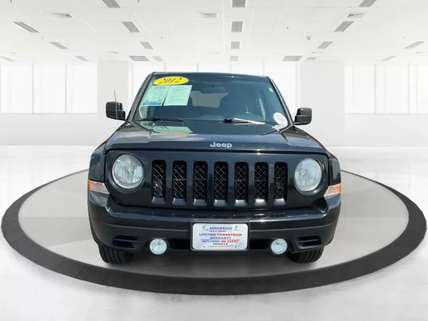 2012 Jeep Patriot Latitude (1C4NJRFB1CD) with an 2.4L I-4 DOHC engine, located at 1230 East Main St, Xenia, OH, 45385, (937) 908-9800, 39.688042, -83.910538 - Photo#6