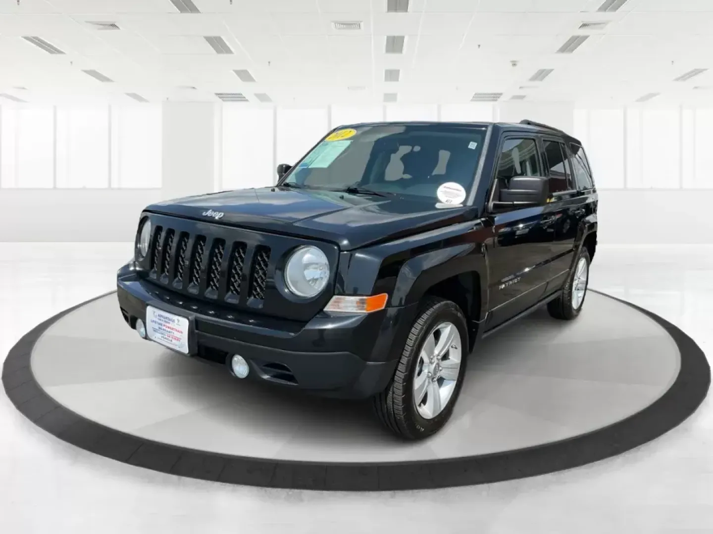 2012 Jeep Patriot Latitude (1C4NJRFB1CD) with an 2.4L I-4 DOHC engine, located at 1230 East Main St, Xenia, OH, 45385, (937) 908-9800, 39.688042, -83.910538 - Photo#7