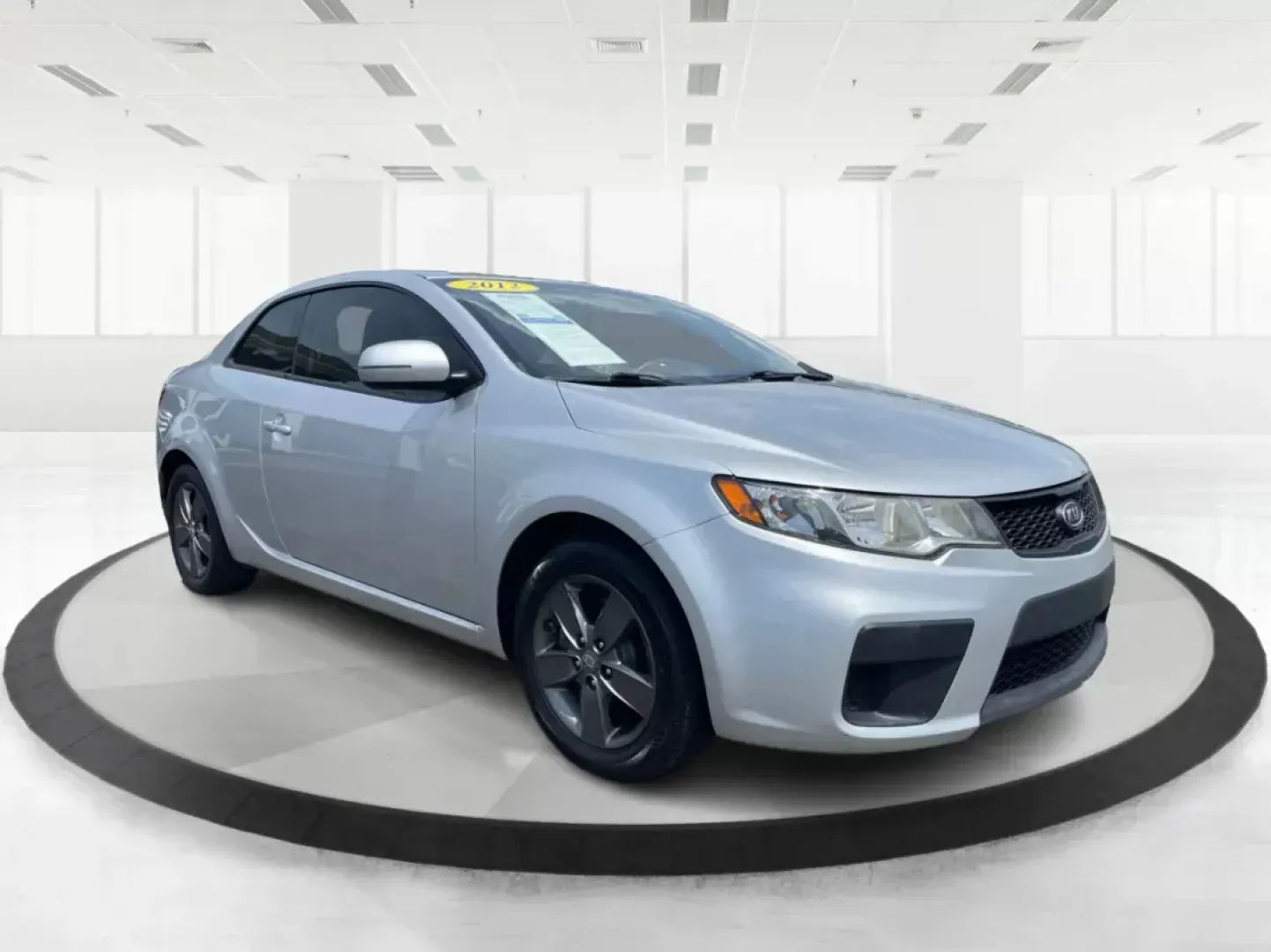 2012 Kia Forte Koup EX (KNAFU6A20C5) with an 2L I-4 DOHC engine, located at 8750 N County Rd 25A, Piqua, OH, 45356, (937) 908-9800, 40.164391, -84.232513 - Photo#0