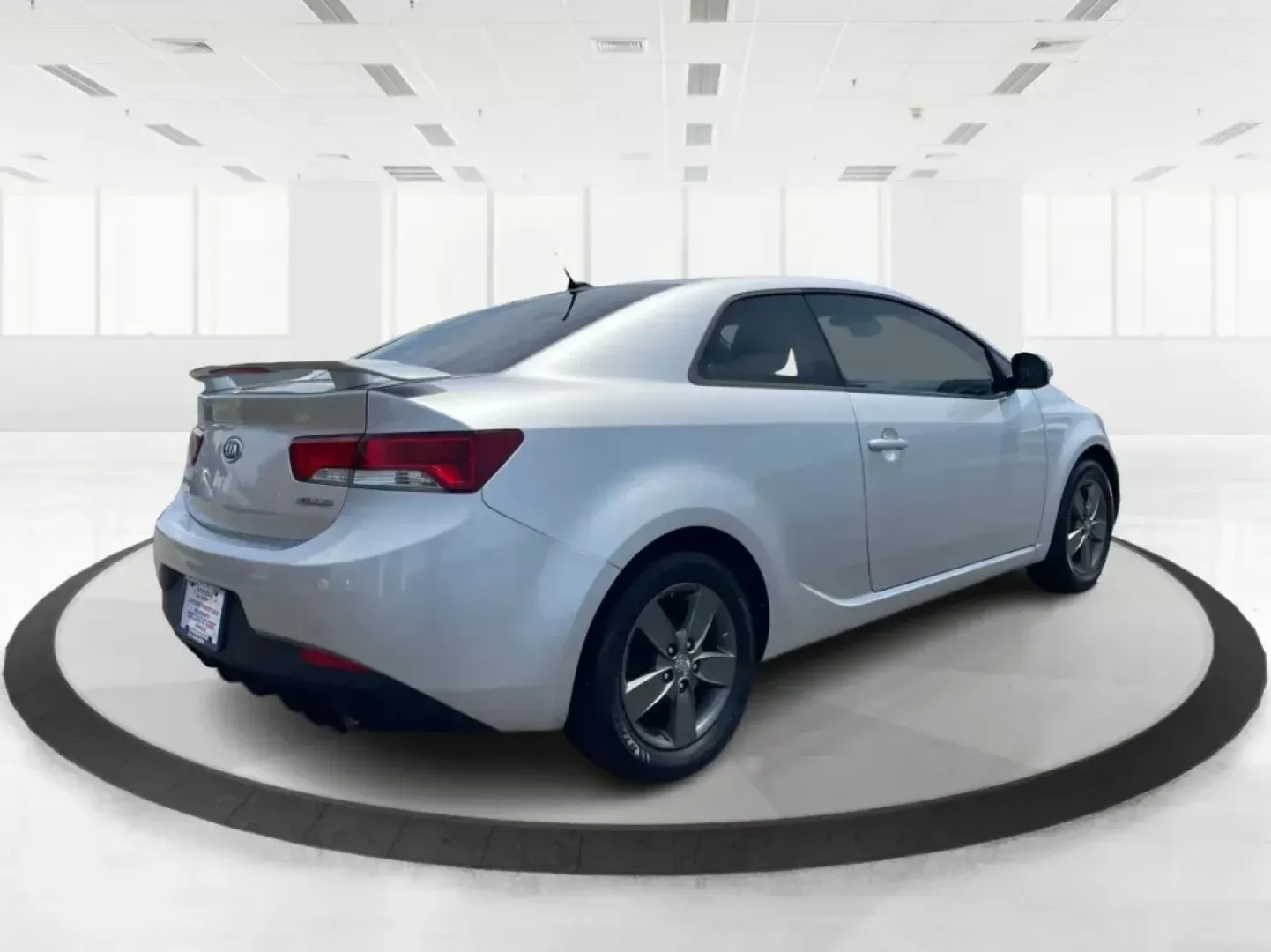 2012 Kia Forte Koup EX (KNAFU6A20C5) with an 2L I-4 DOHC engine, located at 8750 N County Rd 25A, Piqua, OH, 45356, (937) 908-9800, 40.164391, -84.232513 - Photo#2