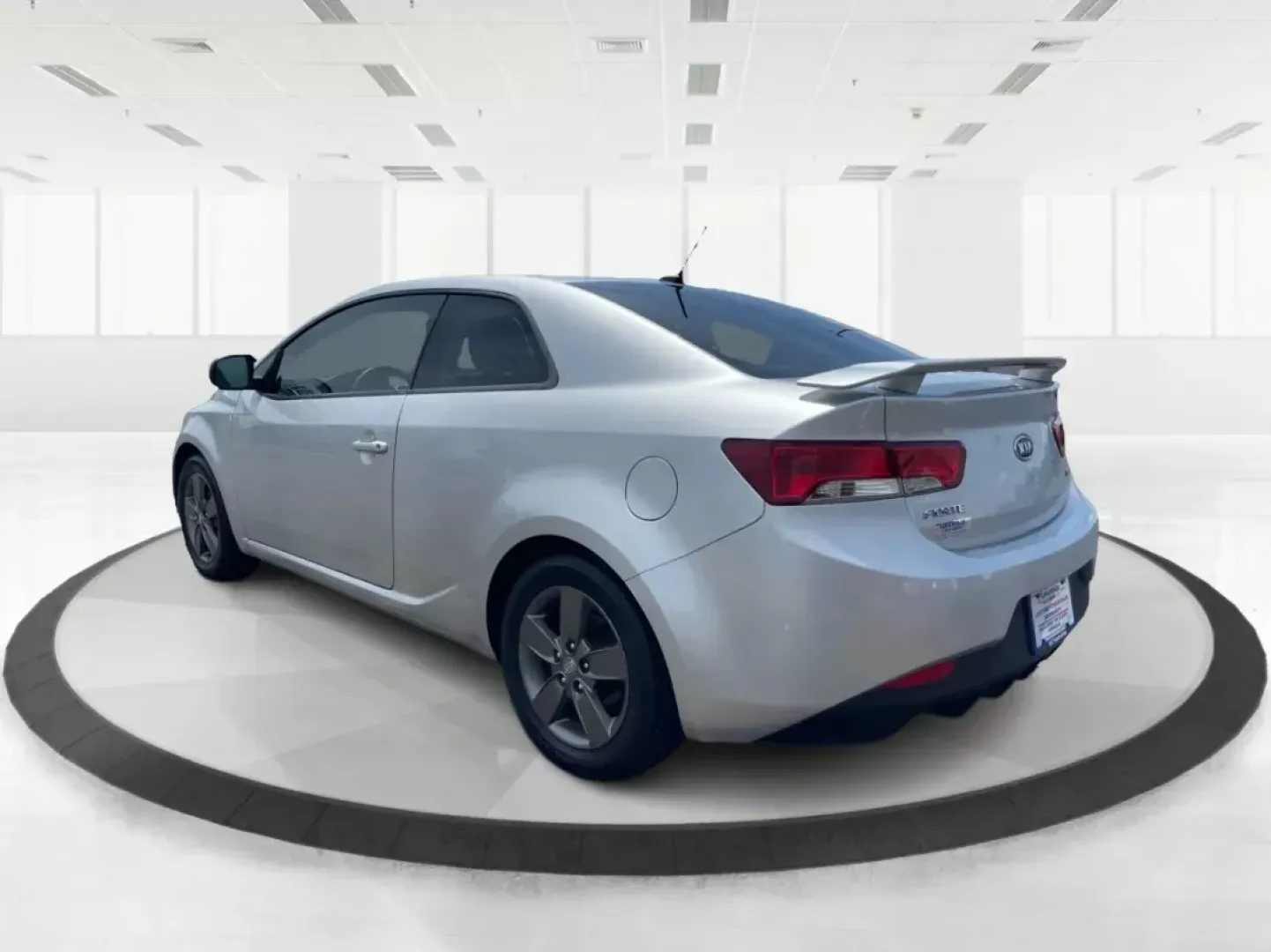 2012 Kia Forte Koup EX (KNAFU6A20C5) with an 2L I-4 DOHC engine, located at 8750 N County Rd 25A, Piqua, OH, 45356, (937) 908-9800, 40.164391, -84.232513 - Photo#4