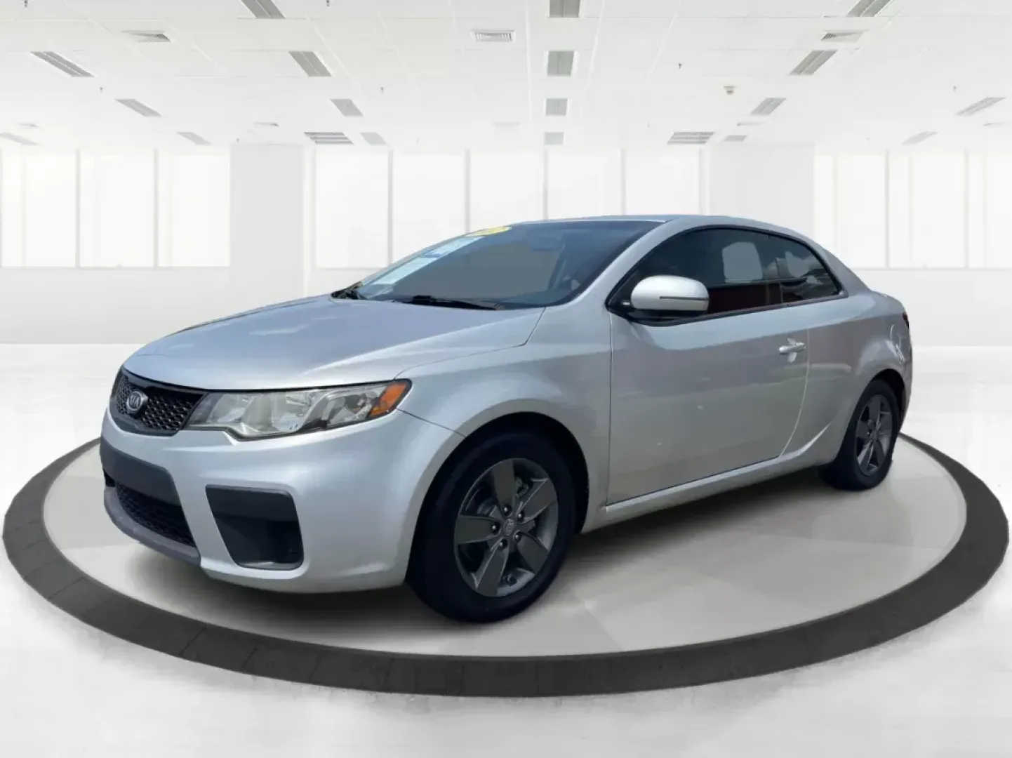 2012 Kia Forte Koup EX (KNAFU6A20C5) with an 2L I-4 DOHC engine, located at 8750 N County Rd 25A, Piqua, OH, 45356, (937) 908-9800, 40.164391, -84.232513 - Photo#7