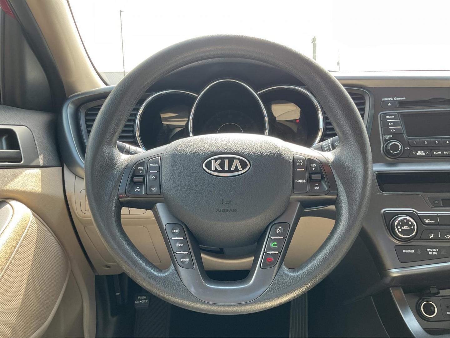 2012 Spicy Red Metallic Kia Optima LX AT (5XXGM4A73CG) with an 2.4L L4 DOHC 16V engine, 6-Speed Automatic transmission, located at 1099 N County Rd 25A , Troy, OH, 45373, (937) 908-9800, 40.057041, -84.215462 - Photo#15
