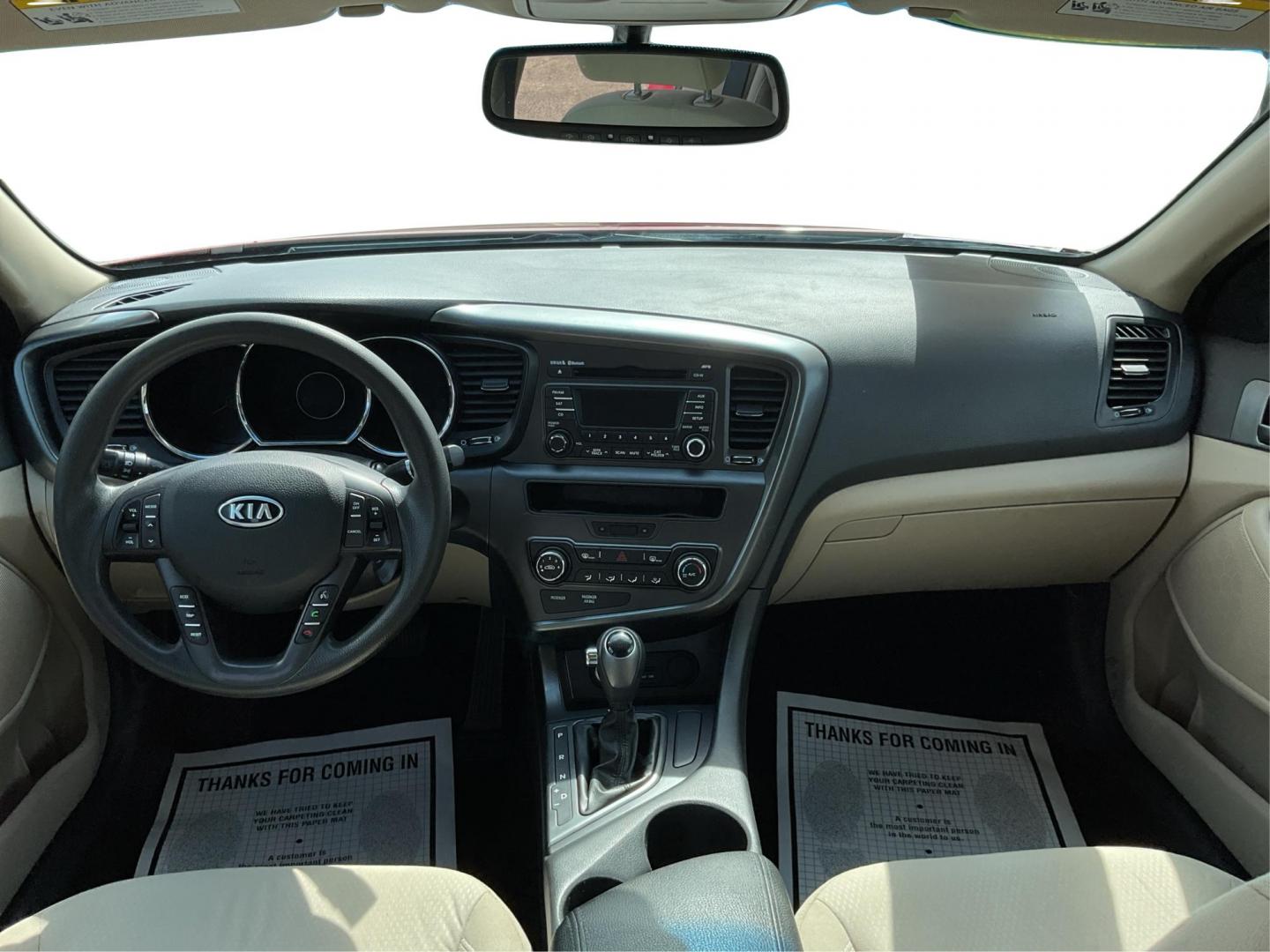 2012 Spicy Red Metallic Kia Optima LX AT (5XXGM4A73CG) with an 2.4L L4 DOHC 16V engine, 6-Speed Automatic transmission, located at 1099 N County Rd 25A , Troy, OH, 45373, (937) 908-9800, 40.057041, -84.215462 - Photo#19