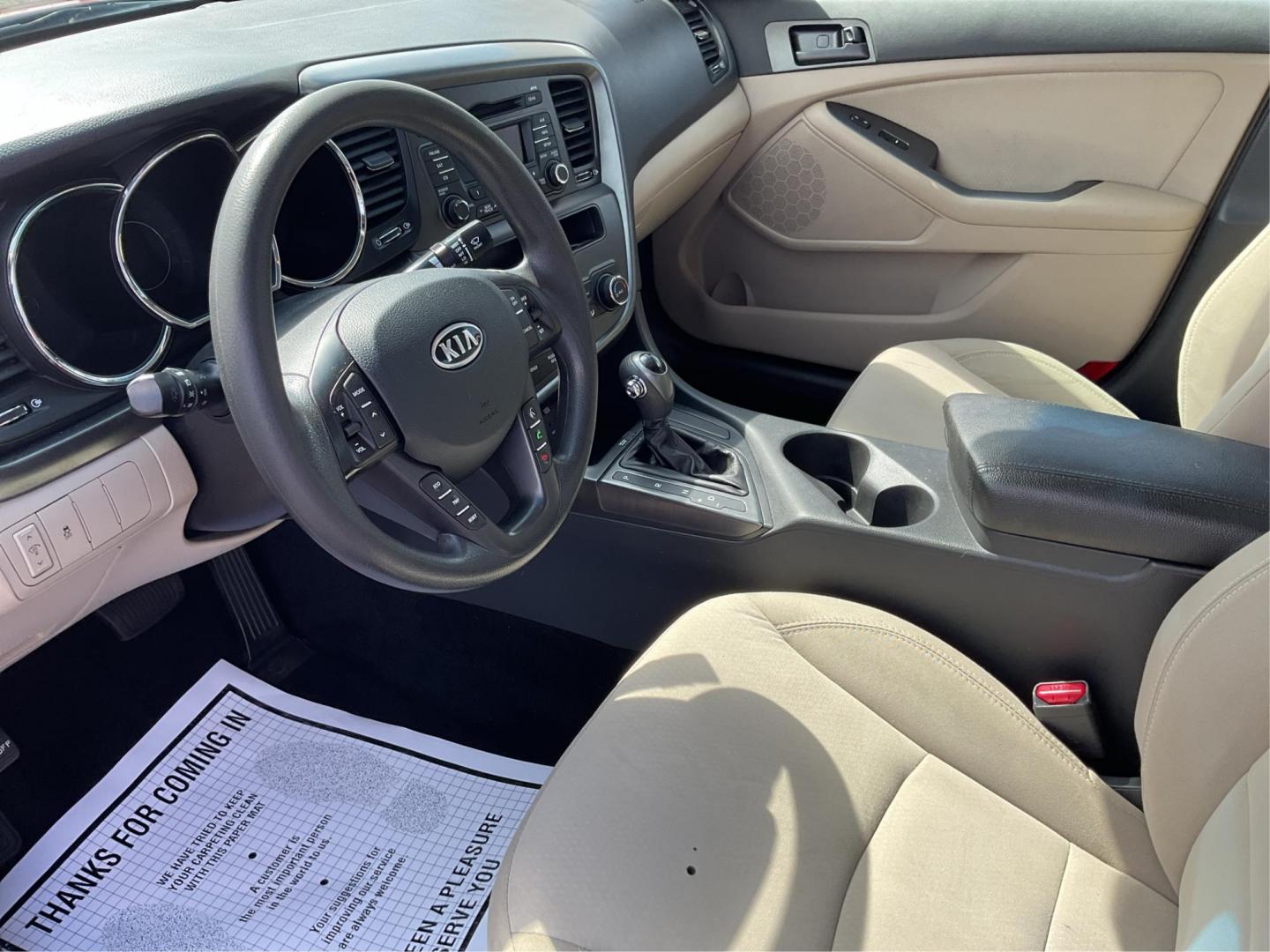 2012 Spicy Red Metallic Kia Optima LX AT (5XXGM4A73CG) with an 2.4L L4 DOHC 16V engine, 6-Speed Automatic transmission, located at 1099 N County Rd 25A , Troy, OH, 45373, (937) 908-9800, 40.057041, -84.215462 - Photo#8