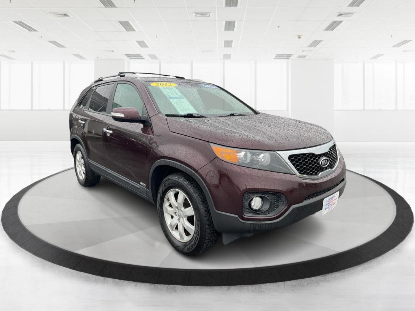2012 Kia Sorento LX (5XYKTDA6XCG) with an 2.4L I-4 gasoline direct injection engine, located at 1951 S Dayton Lakeview Rd., New Carlisle, OH, 45344, (937) 908-9800, 39.890999, -84.050255 - Photo#0