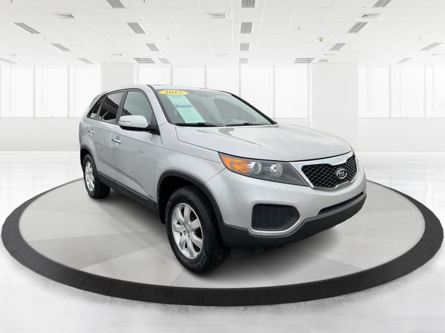 2012 Kia Sorento LX (5XYKTCA68CG) with an 2.4L I-4 gasoline direct injection engine, located at 1184 Kauffman Ave, Fairborn, OH, 45324, (937) 908-9800, 39.807072, -84.031563 - Photo#0
